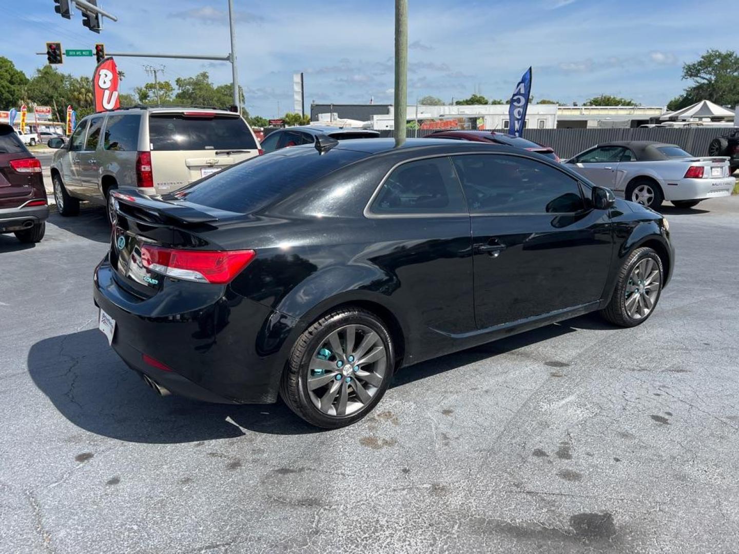 2013 BLACK KIA FORTE SX (KNAFW6A39D5) with an 2.4L engine, Automatic transmission, located at 2929 9th St. West, Bradenton, 34205, (941) 242-2810, 27.473591, -82.570679 - Thanks for inquring into DriveNation USA! All vehicles listed can be viewed at www.drivenationusa.com for vehicle history reports and additonal info. We cannot quote any terms such as down payments or monthly payments without an application. You can apply directly at www.drivenationusa.com or by con - Photo#6