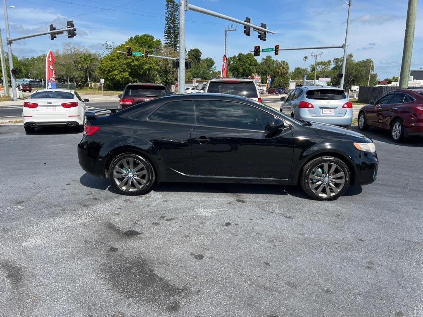 2013 BLACK KIA FORTE SX (KNAFW6A39D5) with an 2.4L engine, Automatic transmission, located at 2929 9th St. West, Bradenton, 34205, (941) 242-2810, 27.473591, -82.570679 - Thanks for inquring into DriveNation USA! All vehicles listed can be viewed at www.drivenationusa.com for vehicle history reports and additonal info. We cannot quote any terms such as down payments or monthly payments without an application. You can apply directly at www.drivenationusa.com or by con - Photo#7