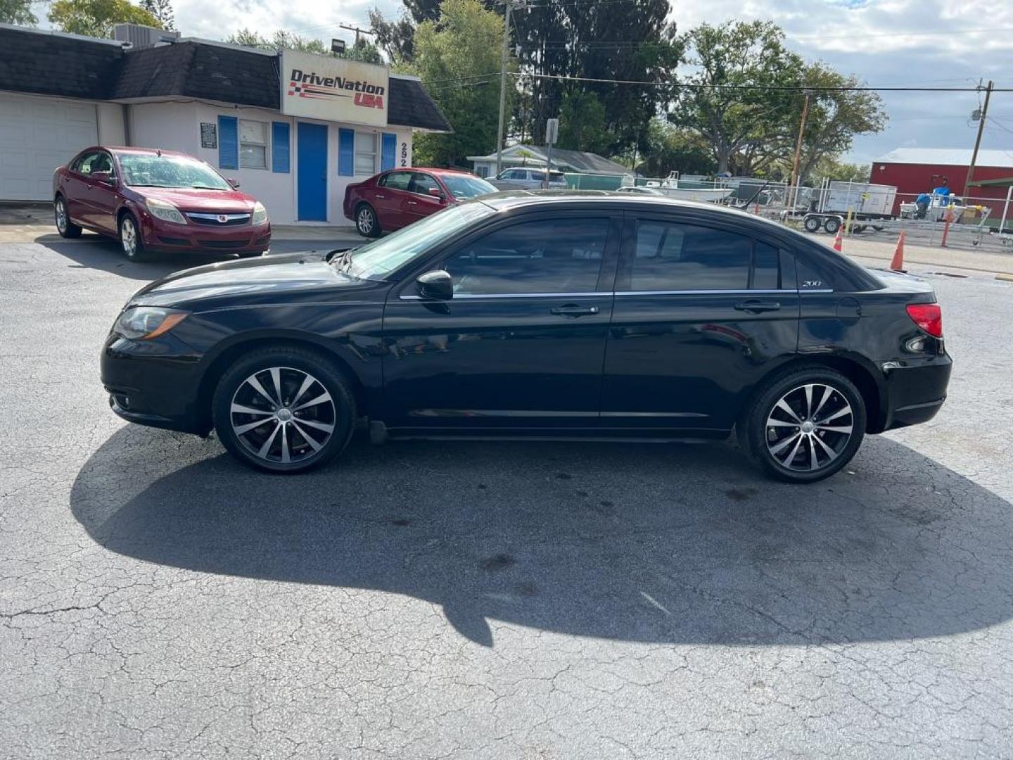 2013 BLACK CHRYSLER 200 TOURING (1C3CCBBB3DN) with an 2.4L engine, Automatic transmission, located at 2929 9th St. West, Bradenton, 34205, (941) 242-2810, 27.473591, -82.570679 - Photo#5