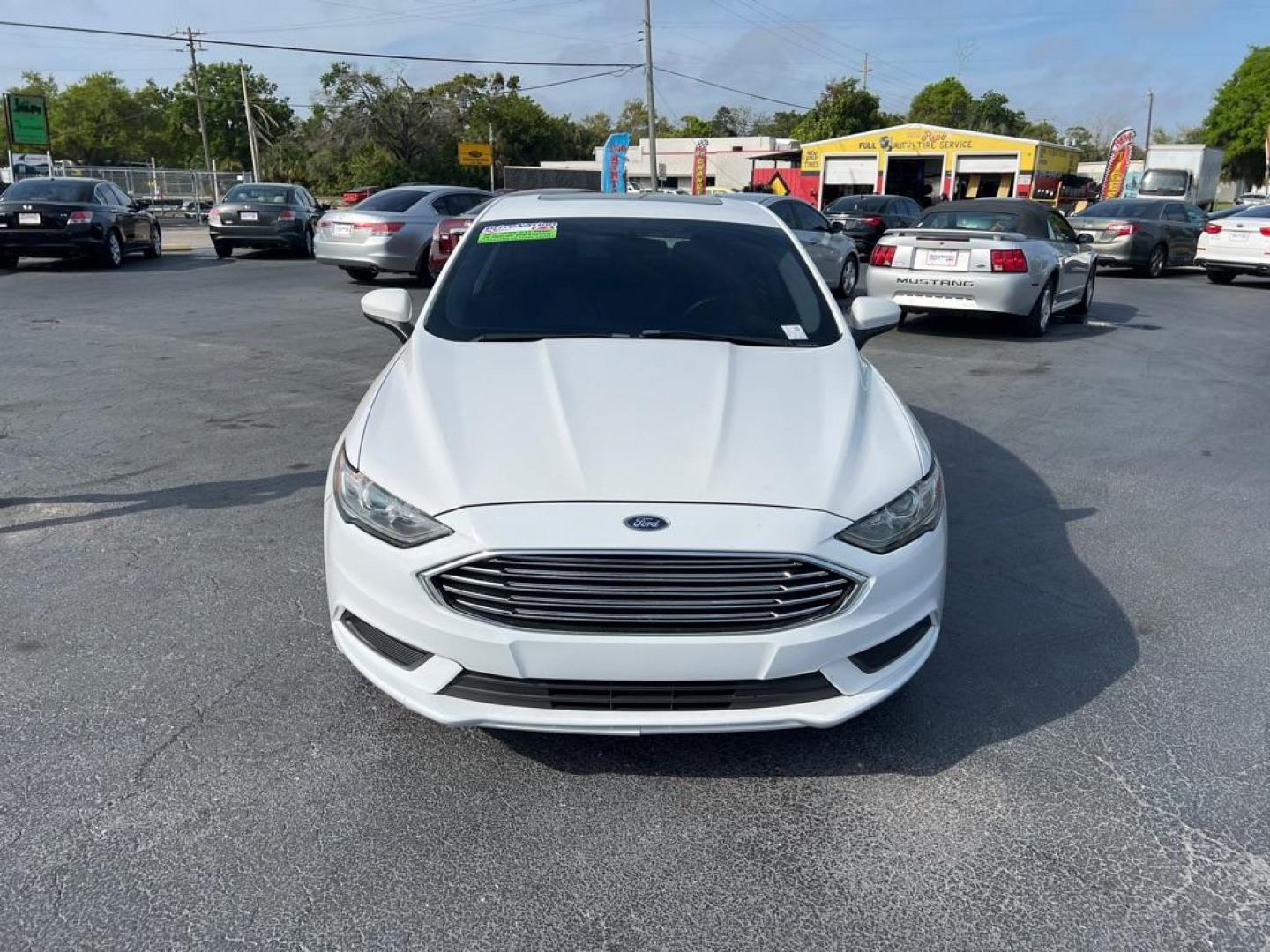 2018 WHITE FORD FUSION SE HYBRID (3FA6P0LU1JR) with an 2.0L engine, Continuously Variable transmission, located at 2929 9th St. West, Bradenton, 34205, (941) 242-2810, 27.473591, -82.570679 - Photo#2