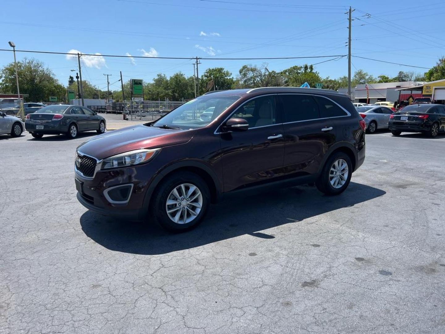 2016 RED KIA SORENTO LX (5XYPG4A53GG) with an 3.3L engine, Automatic transmission, located at 2929 9th St. West, Bradenton, 34205, (941) 242-2810, 27.473591, -82.570679 - Photo#3