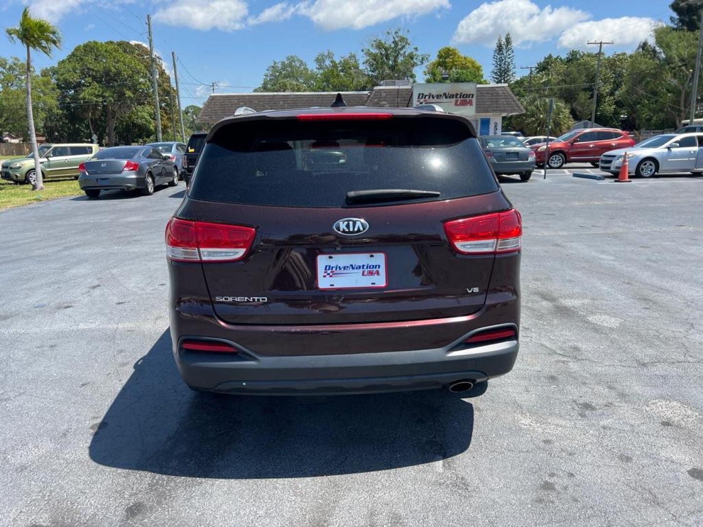 2016 RED KIA SORENTO LX (5XYPG4A53GG) with an 3.3L engine, Automatic transmission, located at 2929 9th St. West, Bradenton, 34205, (941) 242-2810, 27.473591, -82.570679 - Photo#6