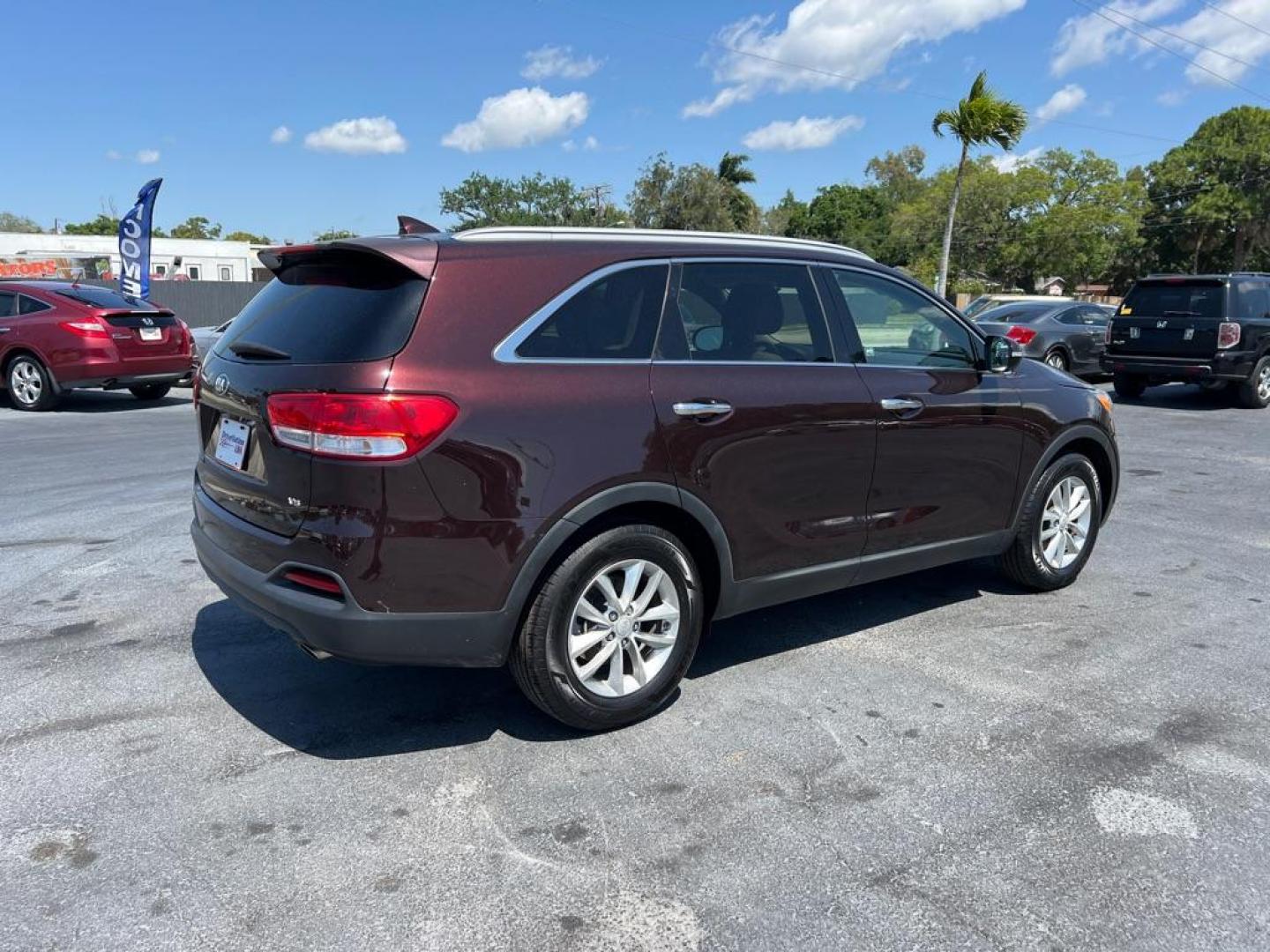 2016 RED KIA SORENTO LX (5XYPG4A53GG) with an 3.3L engine, Automatic transmission, located at 2929 9th St. West, Bradenton, 34205, (941) 242-2810, 27.473591, -82.570679 - Photo#7