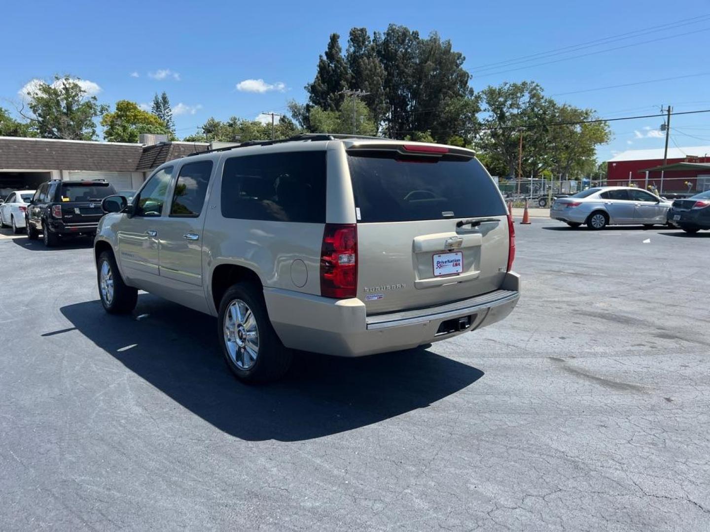 2009 GOLD CHEVROLET SUBURBAN 1500 LTZ (1GNFC36029R) with an 5.3L engine, Automatic transmission, located at 2929 9th St. West, Bradenton, 34205, (941) 242-2810, 27.473591, -82.570679 - Thanks for inquring into DriveNation USA! All vehicles listed can be viewed at www.drivenationusa.com for vehicle history reports and additonal info. We cannot quote any terms such as down payments or monthly payments without an application. You can apply directly at www.drivenationusa.com or by con - Photo#5