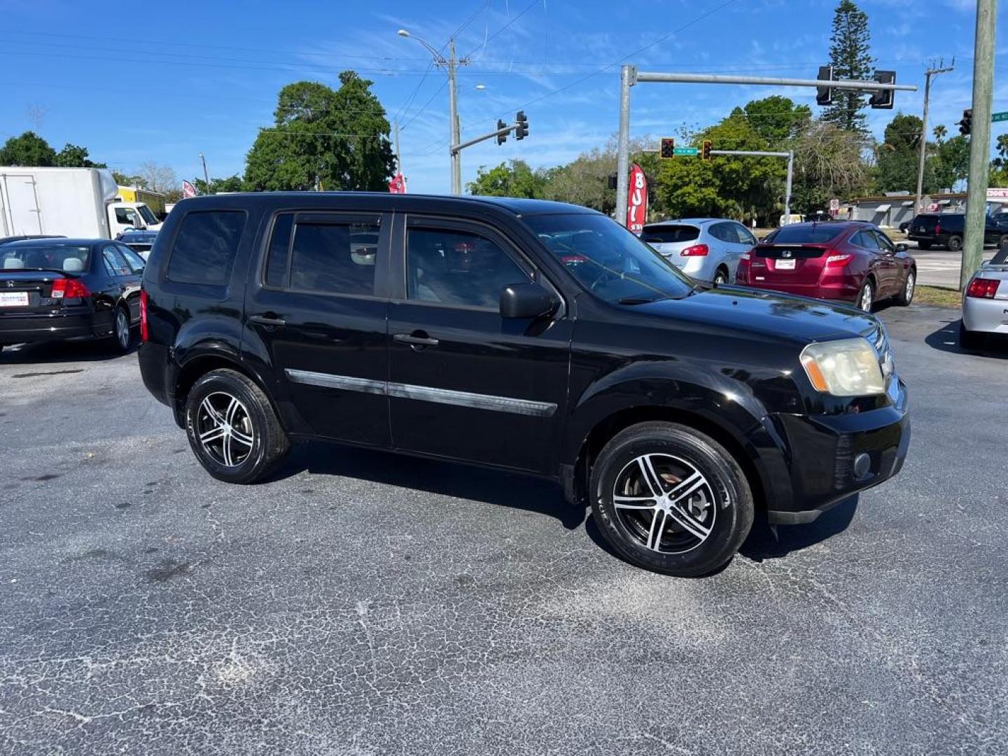 2011 BLACK HONDA PILOT LX (5FNYF3H20BB) with an 3.5L engine, Automatic transmission, located at 2929 9th St. West, Bradenton, 34205, (941) 242-2810, 27.473591, -82.570679 - Photo#0