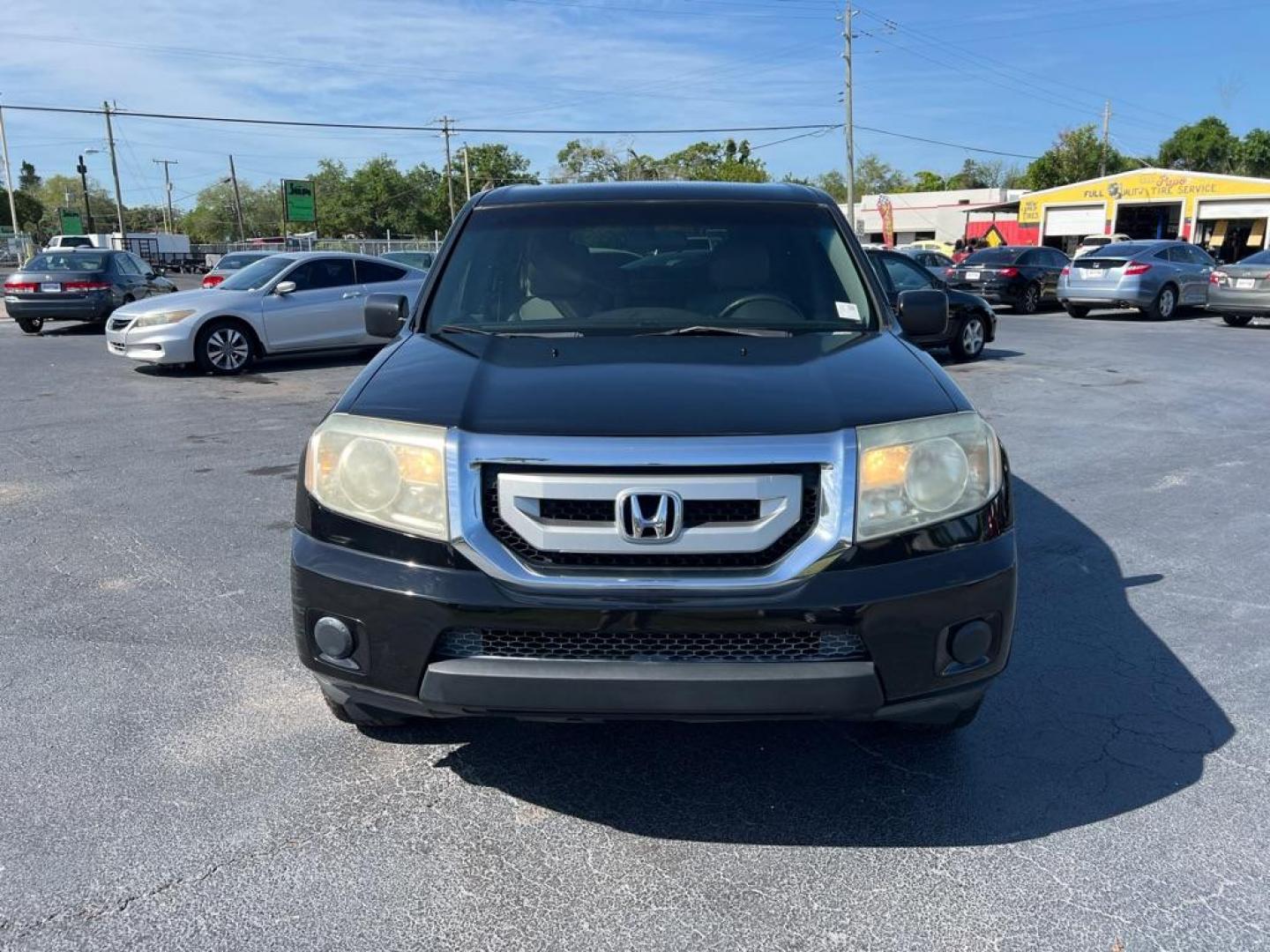 2011 BLACK HONDA PILOT LX (5FNYF3H20BB) with an 3.5L engine, Automatic transmission, located at 2929 9th St. West, Bradenton, 34205, (941) 242-2810, 27.473591, -82.570679 - Photo#3