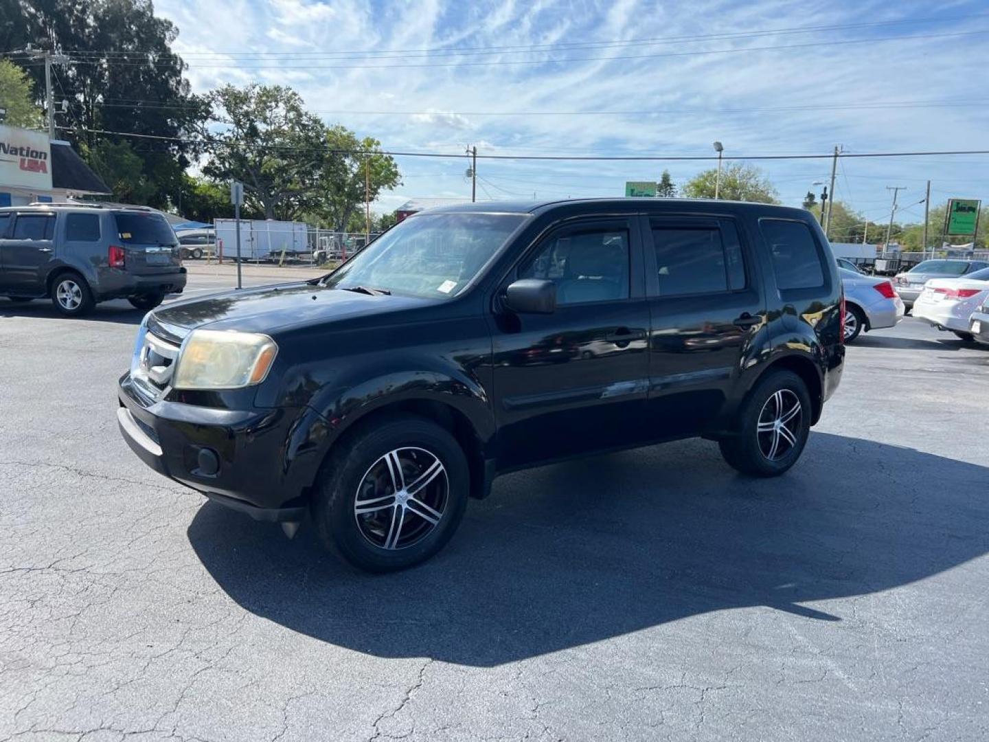 2011 BLACK HONDA PILOT LX (5FNYF3H20BB) with an 3.5L engine, Automatic transmission, located at 2929 9th St. West, Bradenton, 34205, (941) 242-2810, 27.473591, -82.570679 - Photo#4