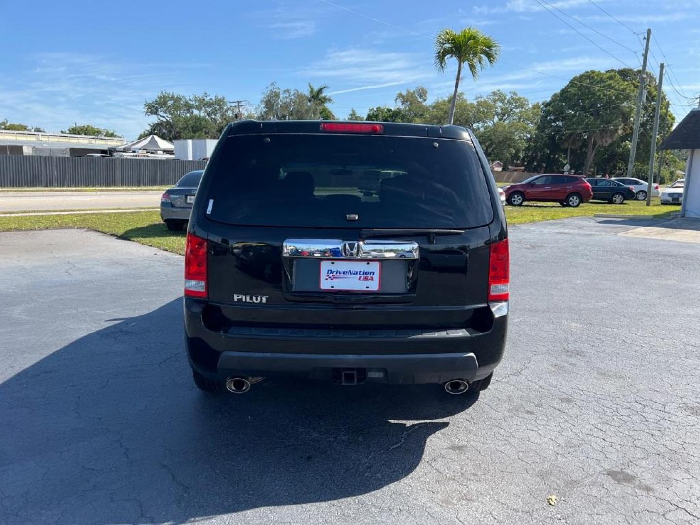 2011 BLACK HONDA PILOT LX (5FNYF3H20BB) with an 3.5L engine, Automatic transmission, located at 2929 9th St. West, Bradenton, 34205, (941) 242-2810, 27.473591, -82.570679 - Photo#6