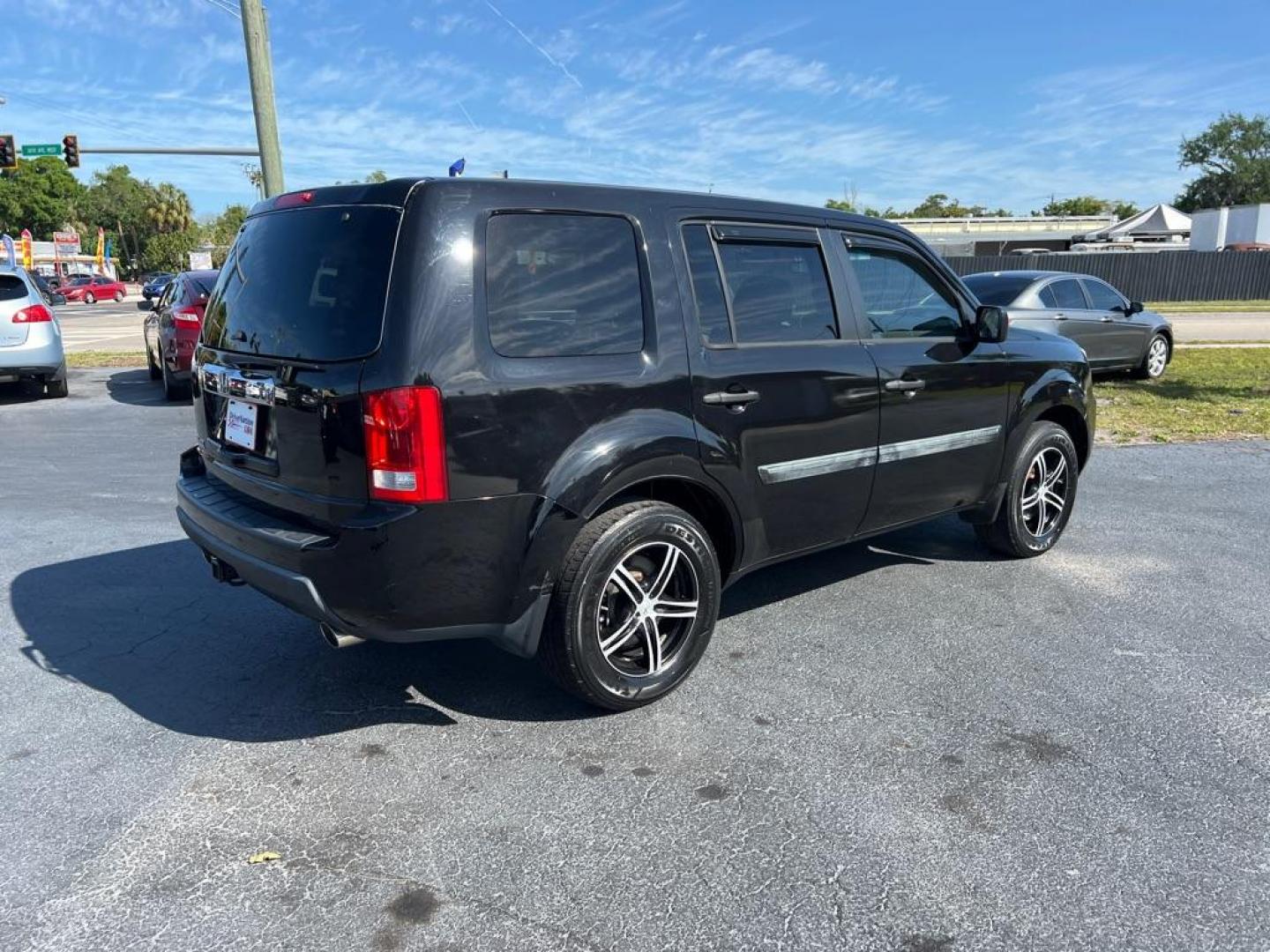 2011 BLACK HONDA PILOT LX (5FNYF3H20BB) with an 3.5L engine, Automatic transmission, located at 2929 9th St. West, Bradenton, 34205, (941) 242-2810, 27.473591, -82.570679 - Photo#7