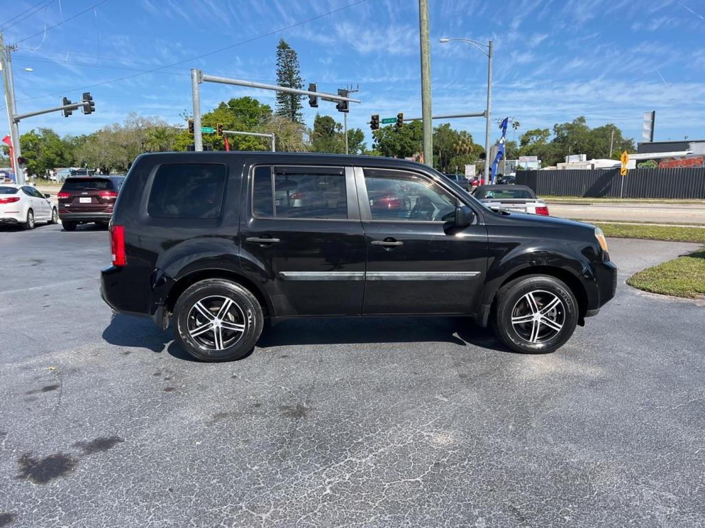 2011 BLACK HONDA PILOT LX (5FNYF3H20BB) with an 3.5L engine, Automatic transmission, located at 2929 9th St. West, Bradenton, 34205, (941) 242-2810, 27.473591, -82.570679 - Photo#8