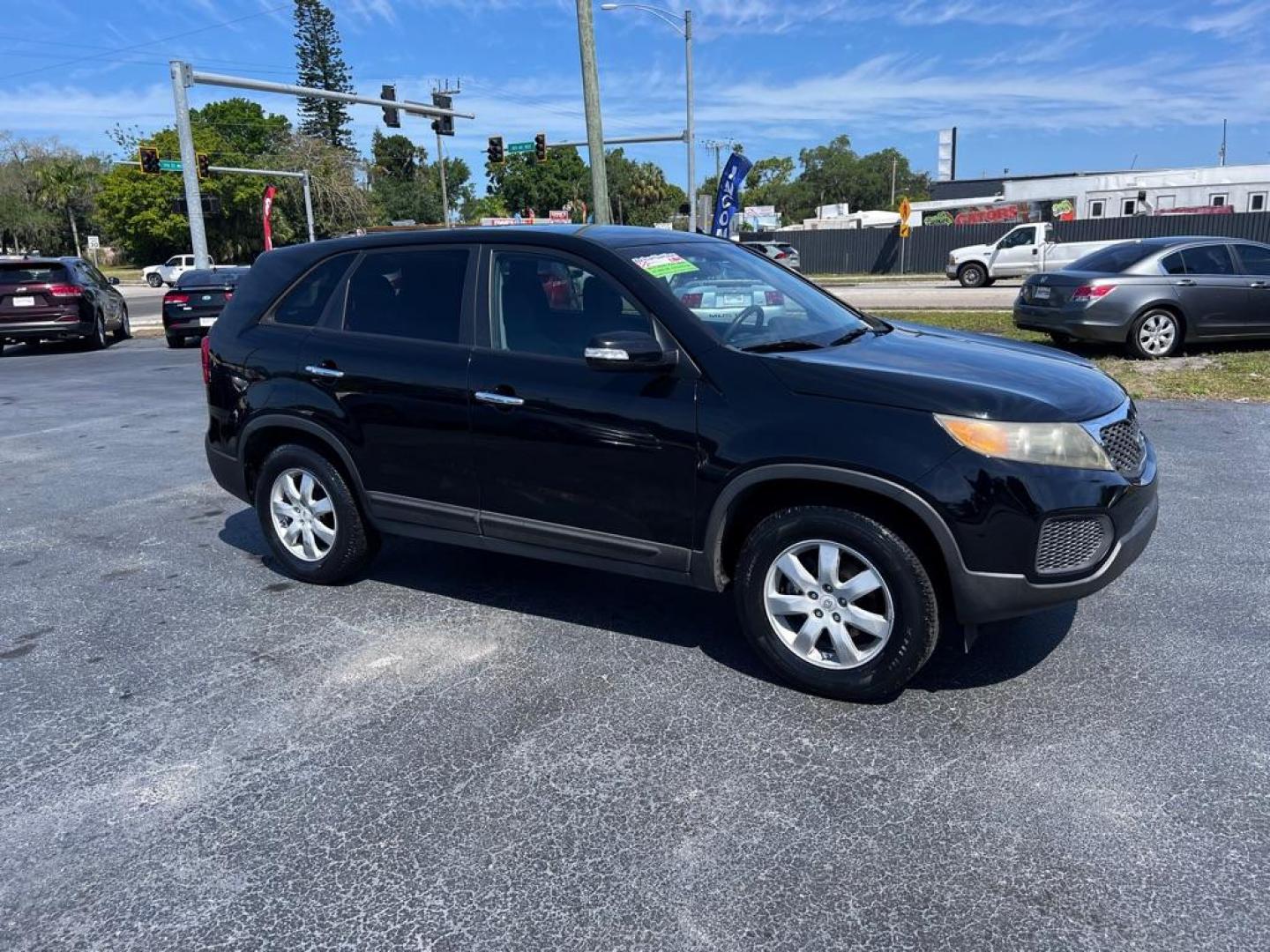 2011 BLACK KIA SORENTO LX (5XYKT3A13BG) with an 2.4L engine, Automatic transmission, located at 2929 9th St. West, Bradenton, 34205, (941) 242-2810, 27.473591, -82.570679 - Photo#0