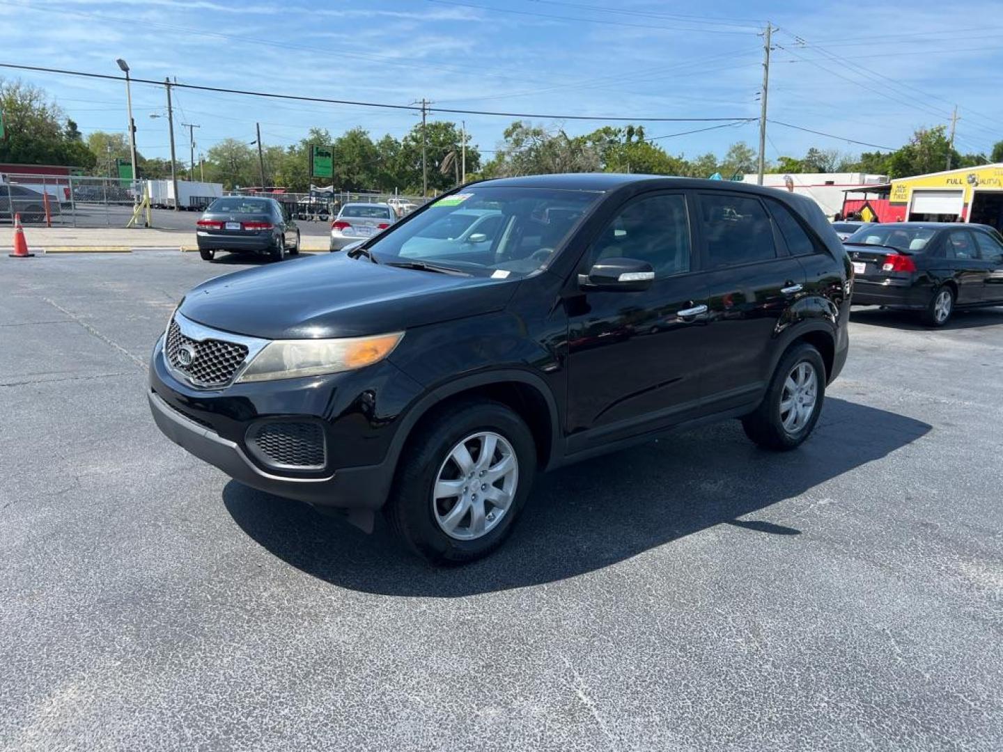 2011 BLACK KIA SORENTO LX (5XYKT3A13BG) with an 2.4L engine, Automatic transmission, located at 2929 9th St. West, Bradenton, 34205, (941) 242-2810, 27.473591, -82.570679 - Photo#2