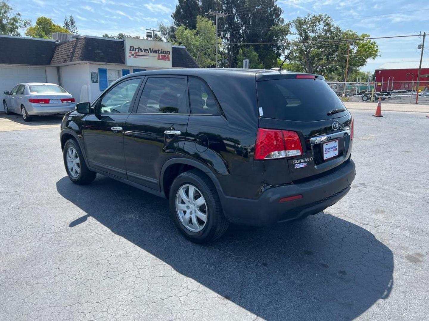 2011 BLACK KIA SORENTO LX (5XYKT3A13BG) with an 2.4L engine, Automatic transmission, located at 2929 9th St. West, Bradenton, 34205, (941) 242-2810, 27.473591, -82.570679 - Photo#4