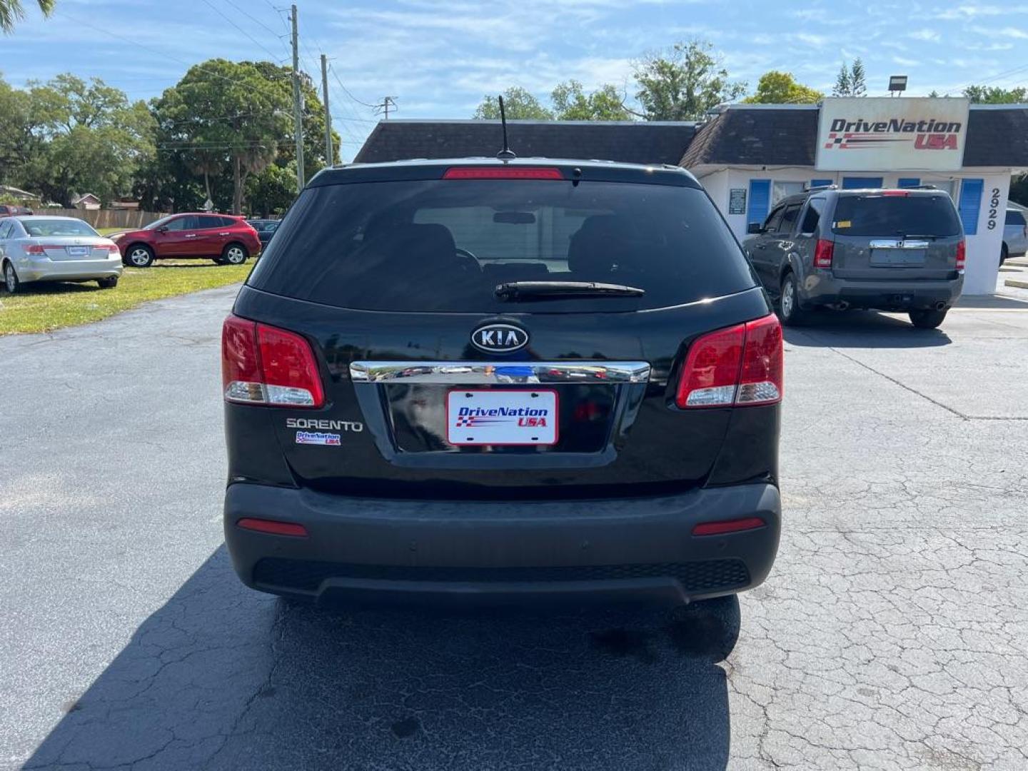 2011 BLACK KIA SORENTO LX (5XYKT3A13BG) with an 2.4L engine, Automatic transmission, located at 2929 9th St. West, Bradenton, 34205, (941) 242-2810, 27.473591, -82.570679 - Photo#5