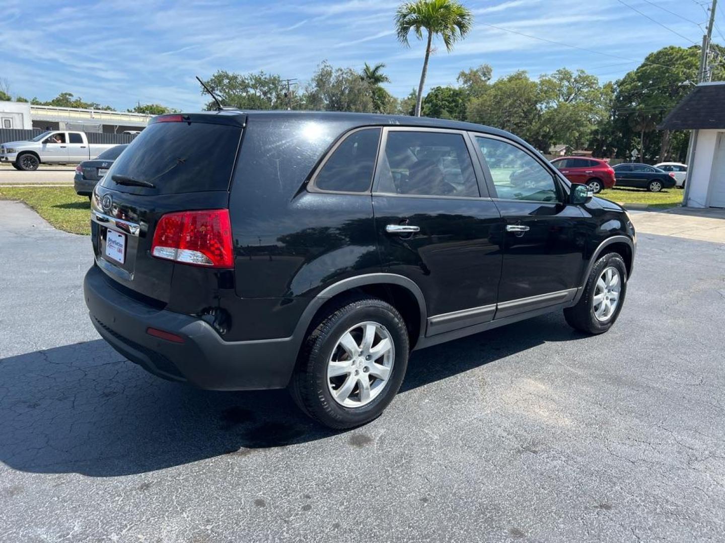 2011 BLACK KIA SORENTO LX (5XYKT3A13BG) with an 2.4L engine, Automatic transmission, located at 2929 9th St. West, Bradenton, 34205, (941) 242-2810, 27.473591, -82.570679 - Photo#6