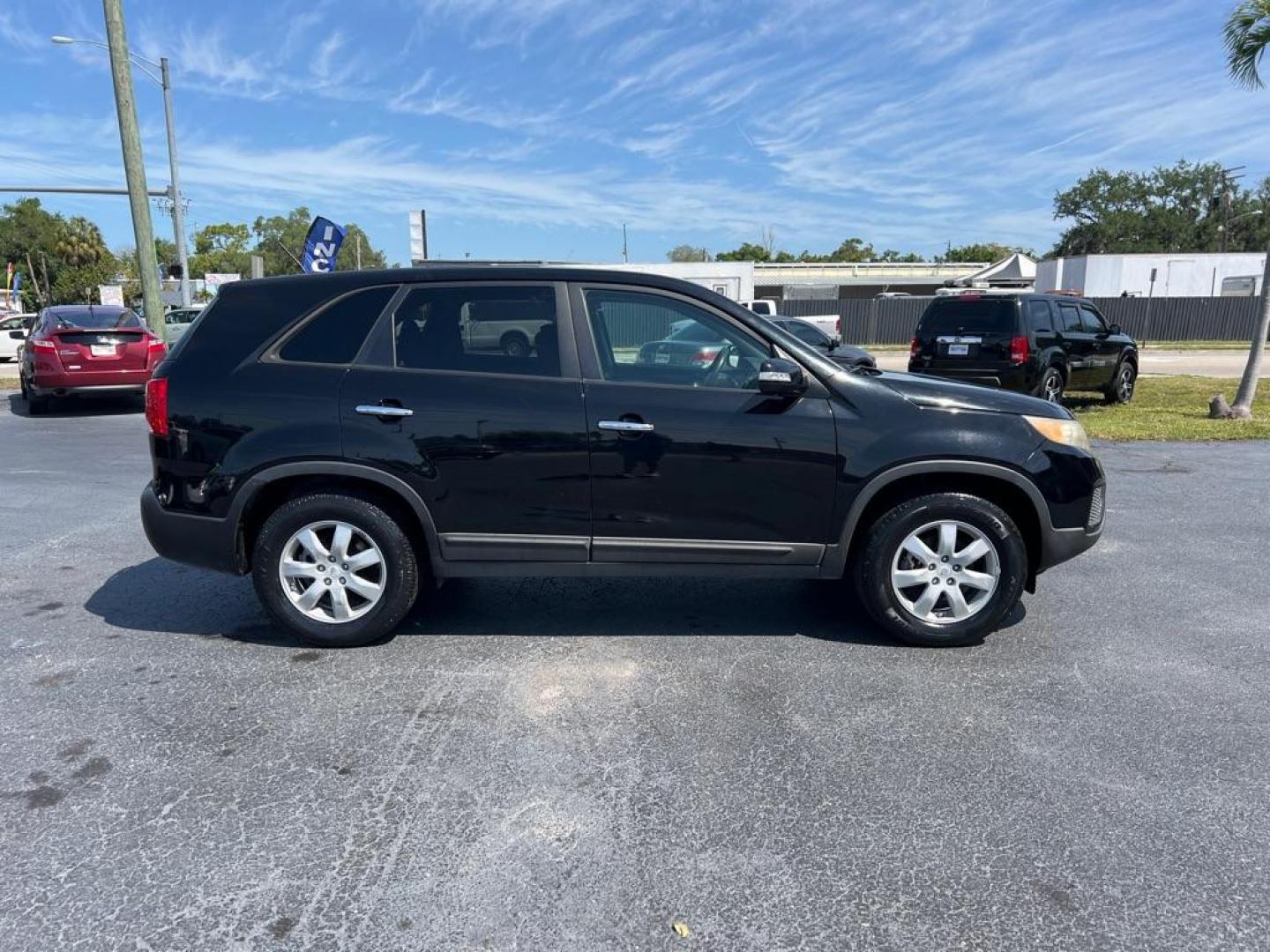 2011 BLACK KIA SORENTO LX (5XYKT3A13BG) with an 2.4L engine, Automatic transmission, located at 2929 9th St. West, Bradenton, 34205, (941) 242-2810, 27.473591, -82.570679 - Photo#7