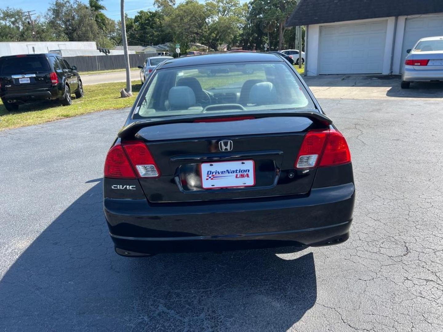 2005 BLACK HONDA CIVIC EX (2HGES26765H) with an 1.7L engine, Automatic transmission, located at 2929 9th St. West, Bradenton, 34205, (941) 242-2810, 27.473591, -82.570679 - Photo#6