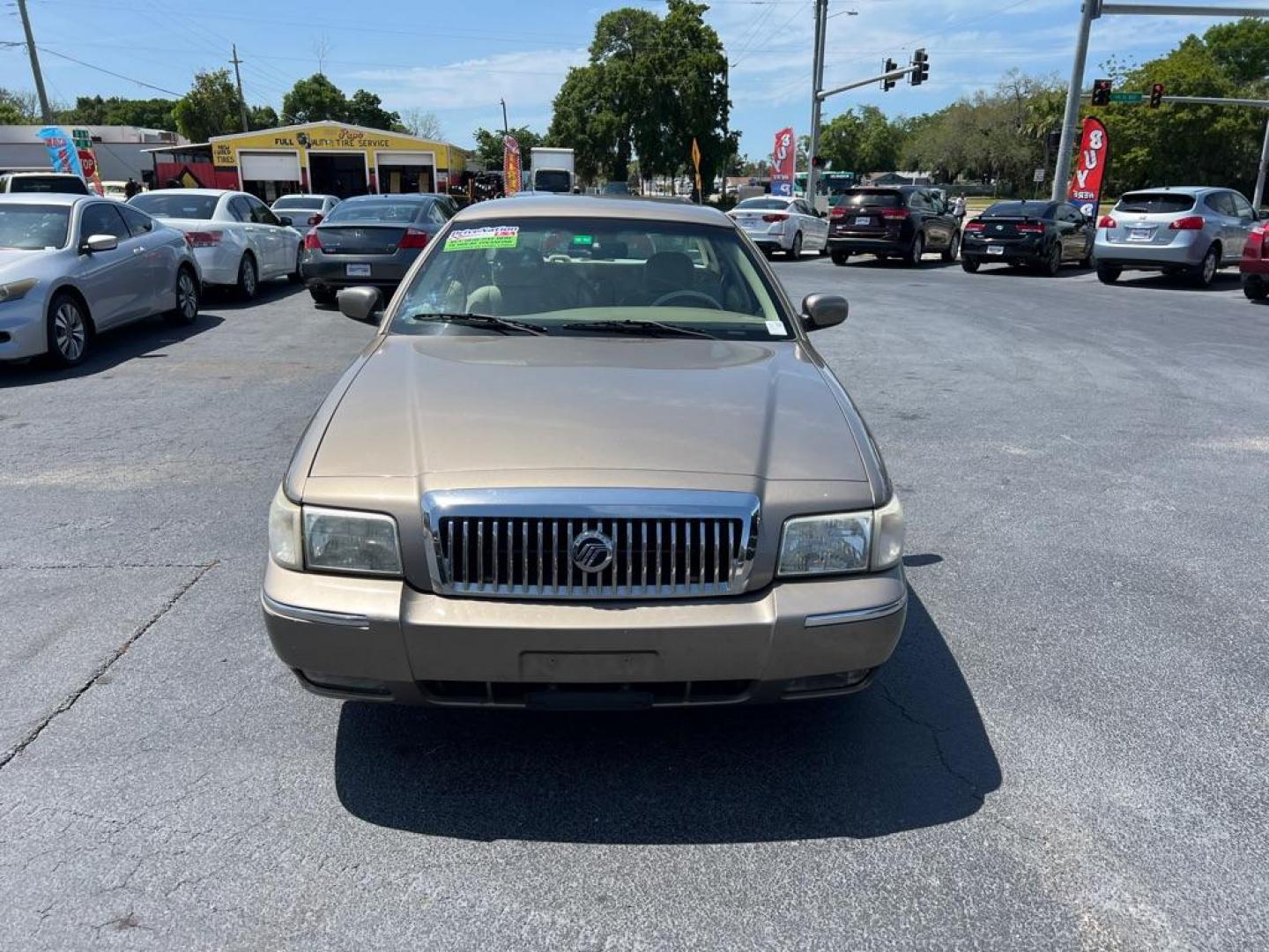 2006 TAN MERCURY GRAND MARQUIS LS (2MEFM75VX6X) with an 4.6L engine, Automatic transmission, located at 2929 9th St. West, Bradenton, 34205, (941) 242-2810, 27.473591, -82.570679 - Photo#2