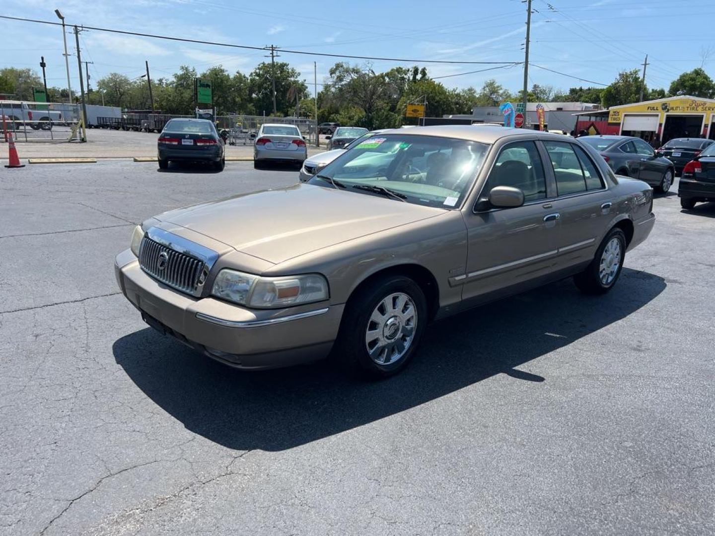 2006 TAN MERCURY GRAND MARQUIS LS (2MEFM75VX6X) with an 4.6L engine, Automatic transmission, located at 2929 9th St. West, Bradenton, 34205, (941) 242-2810, 27.473591, -82.570679 - Photo#3