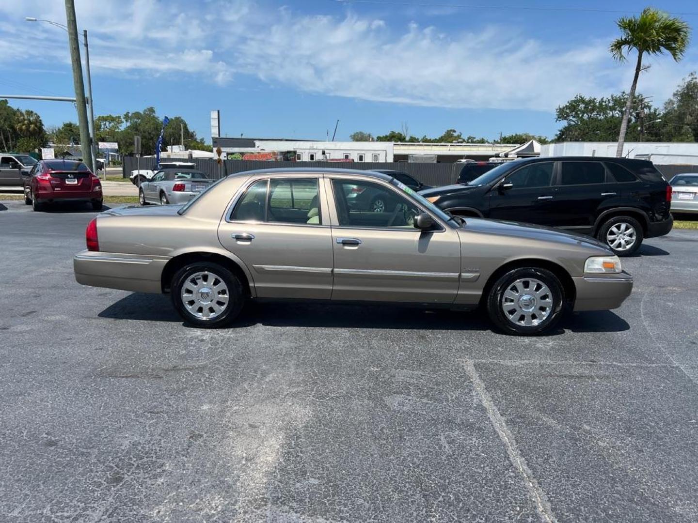 2006 TAN MERCURY GRAND MARQUIS LS (2MEFM75VX6X) with an 4.6L engine, Automatic transmission, located at 2929 9th St. West, Bradenton, 34205, (941) 242-2810, 27.473591, -82.570679 - Photo#7