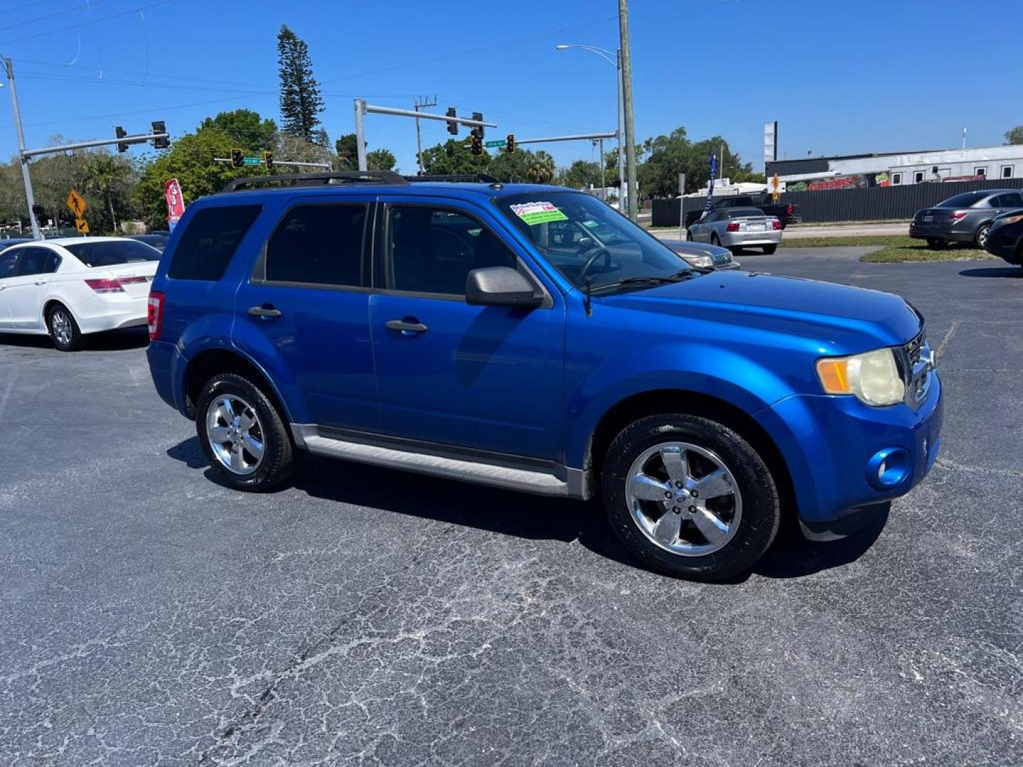 2011 BLUE FORD ESCAPE XLT (1FMCU0DG9BK) with an 3.0L engine, Automatic transmission, located at 2929 9th St. West, Bradenton, 34205, (941) 242-2810, 27.473591, -82.570679 - Photo#0