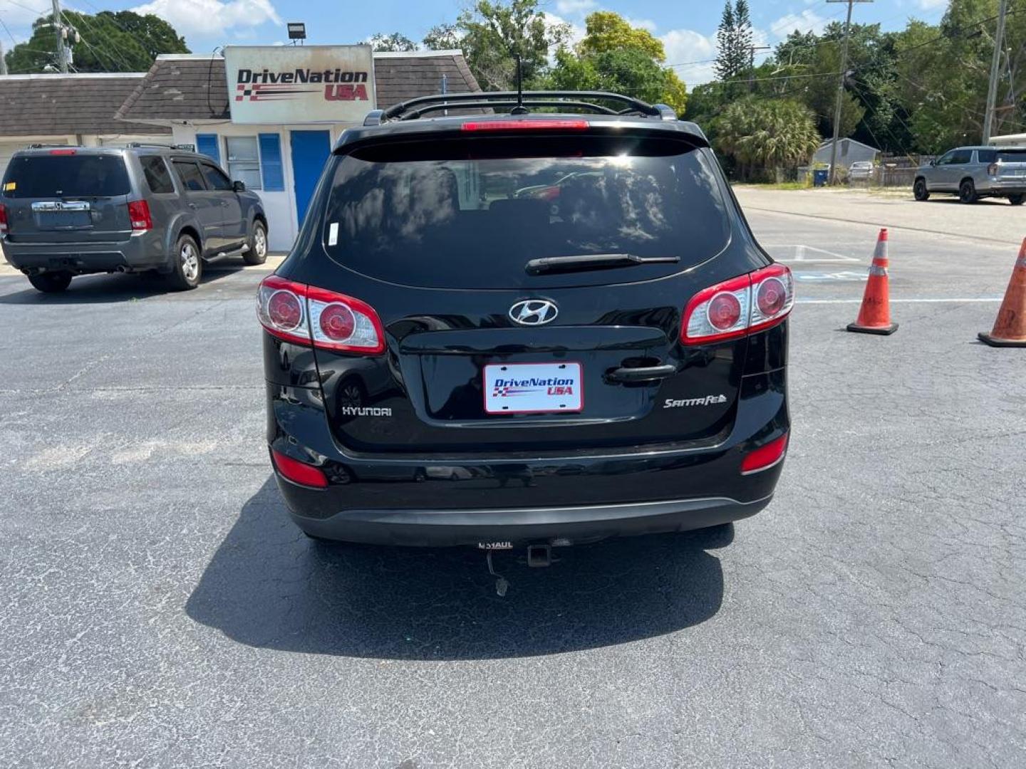 2010 BLACK HYUNDAI SANTA FE SE (5NMSH4AG5AH) with an 3.5L engine, Automatic transmission, located at 2929 9th St. West, Bradenton, 34205, (941) 242-2810, 27.473591, -82.570679 - Photo#5