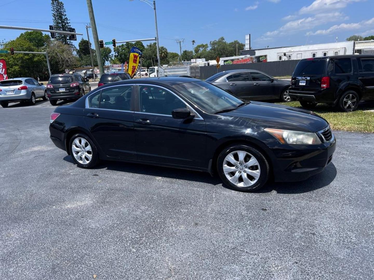 2009 BLACK HONDA ACCORD EXL (1HGCP26869A) with an 2.4L engine, Automatic transmission, located at 2929 9th St. West, Bradenton, 34205, (941) 242-2810, 27.473591, -82.570679 - Photo#0