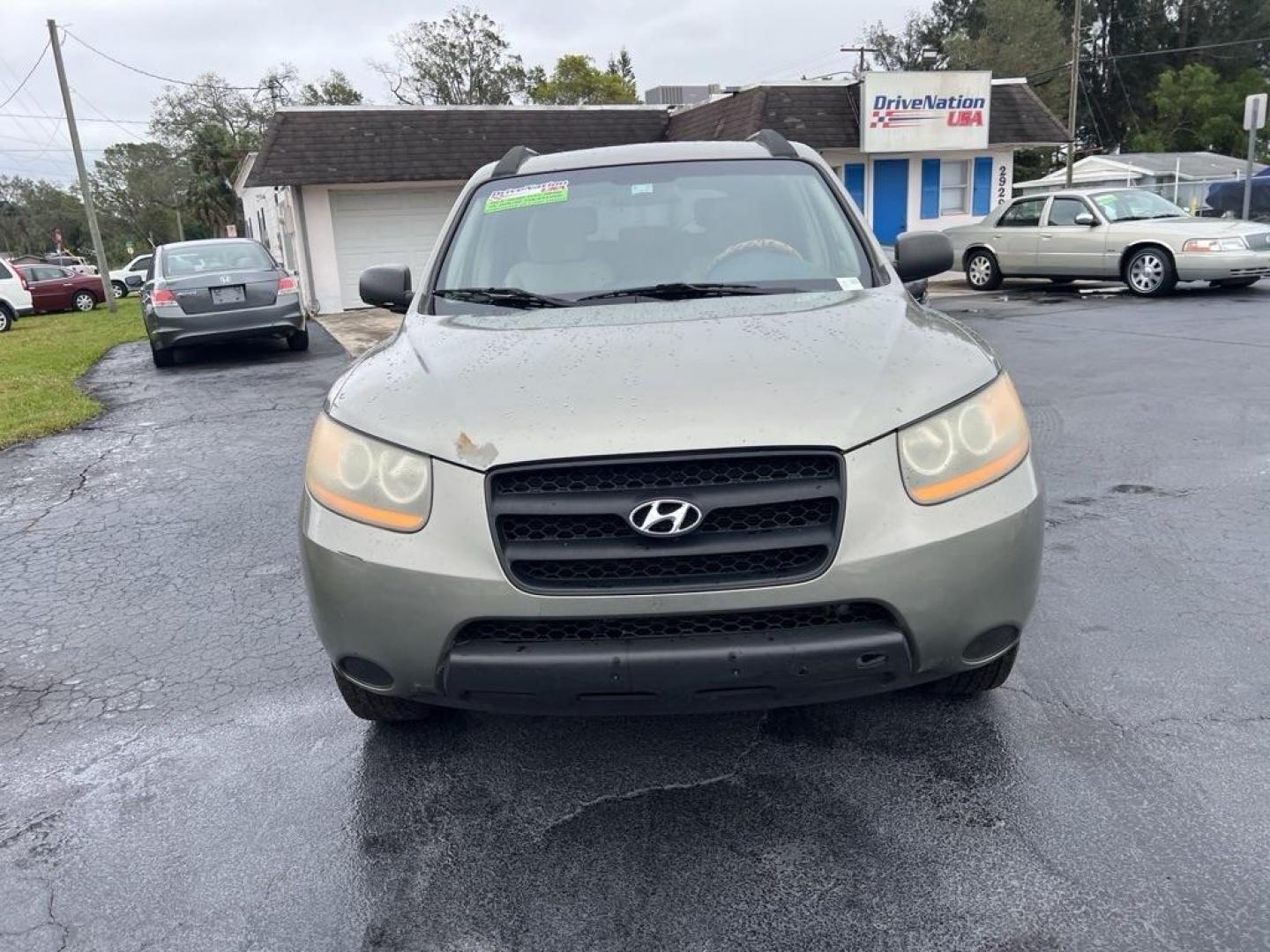 2012 GRAY HYUNDAI SANTA FE GLS (5XYZG3AB7CG) with an 2.4L engine, Automatic transmission, located at 2929 9th St. West, Bradenton, 34205, (941) 242-2810, 27.473591, -82.570679 - Photo#5