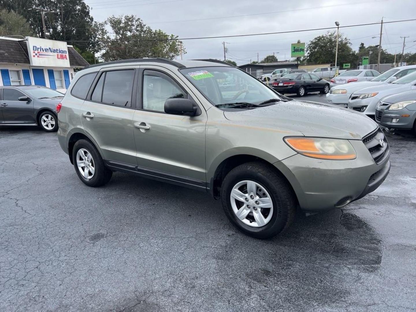 2012 GRAY HYUNDAI SANTA FE GLS (5XYZG3AB7CG) with an 2.4L engine, Automatic transmission, located at 2929 9th St. West, Bradenton, 34205, (941) 242-2810, 27.473591, -82.570679 - Photo#6