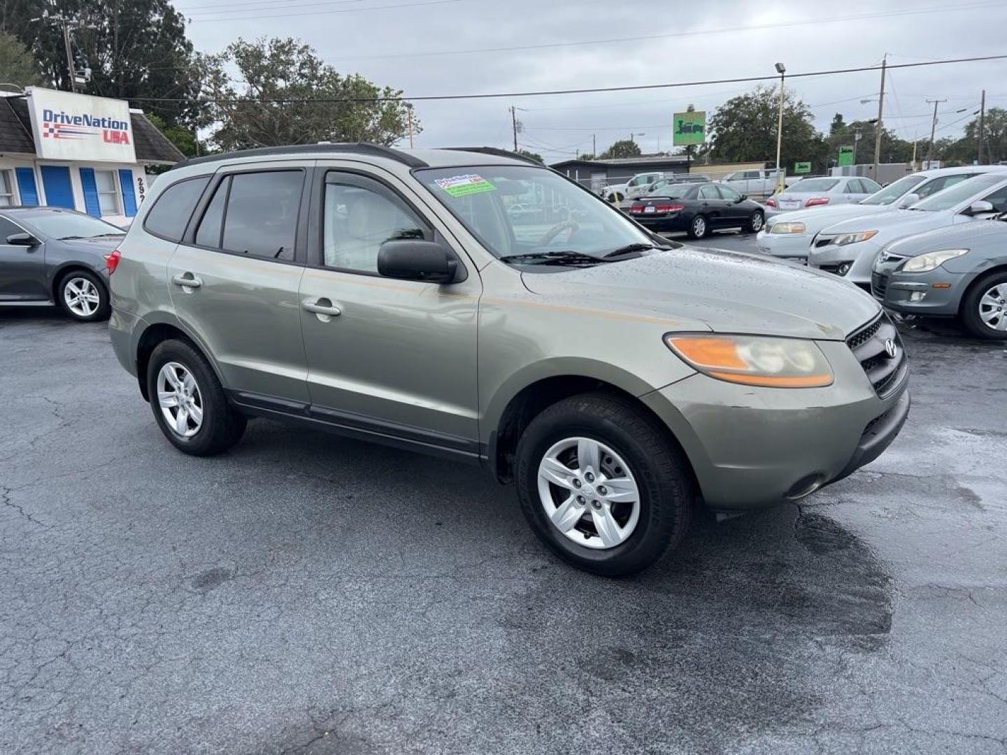 2012 GRAY HYUNDAI SANTA FE GLS (5XYZG3AB7CG) with an 2.4L engine, Automatic transmission, located at 2929 9th St. West, Bradenton, 34205, (941) 242-2810, 27.473591, -82.570679 - Photo#7