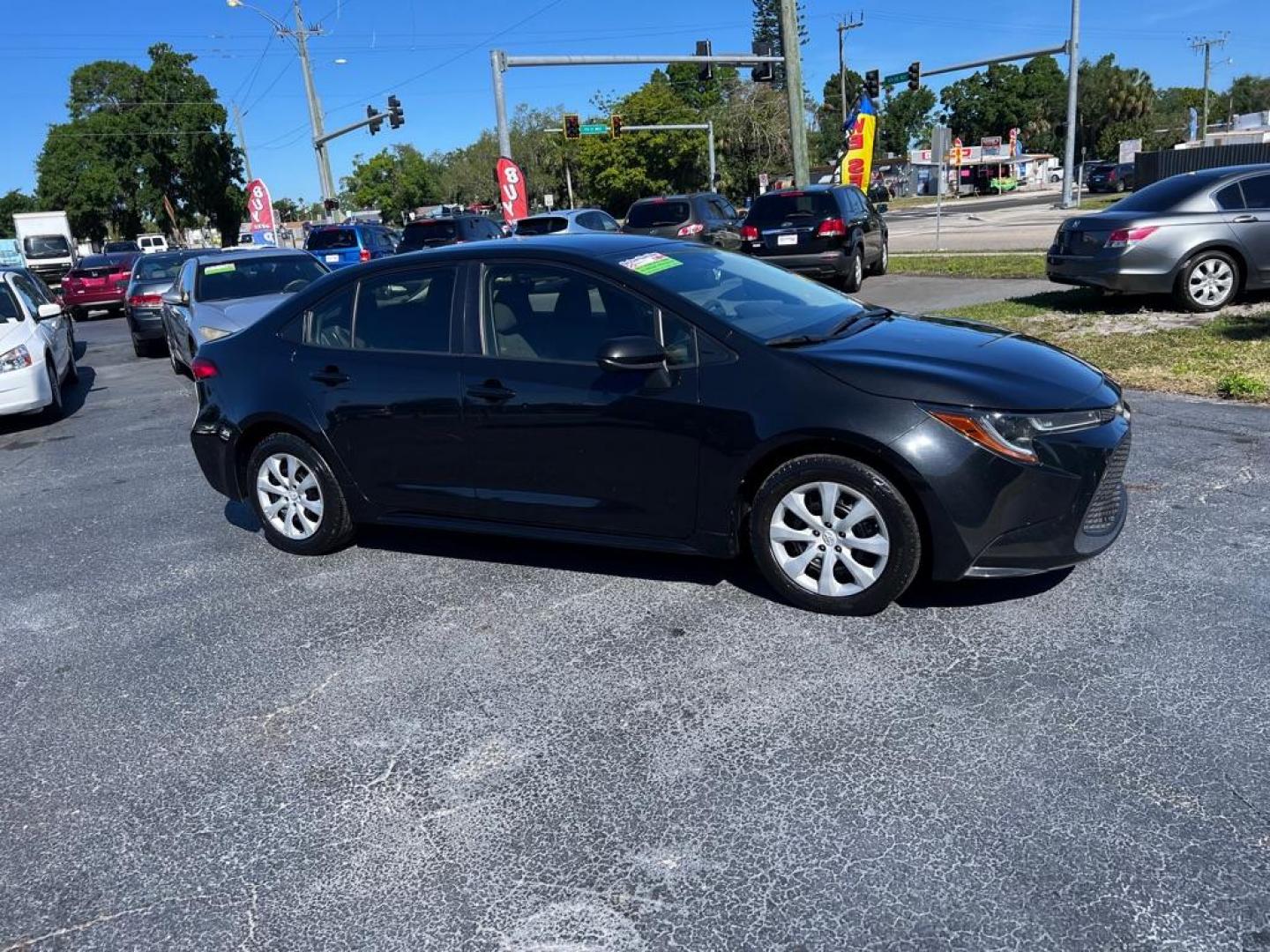 2020 BLACK TOYOTA COROLLA LE (JTDEPRAE5LJ) with an 1.8L engine, Continuously Variable transmission, located at 2929 9th St. West, Bradenton, 34205, (941) 242-2810, 27.473591, -82.570679 - Photo#1