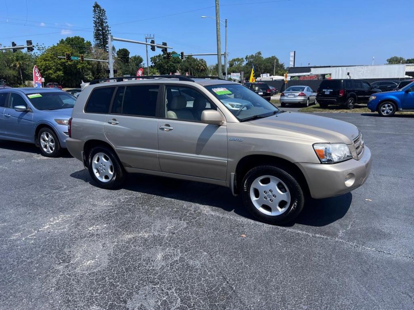 2005 GOLD TOYOTA HIGHLANDER LIMITED (JTEDP21A450) with an 3.3L engine, Automatic transmission, located at 2929 9th St. West, Bradenton, 34205, (941) 242-2810, 27.473591, -82.570679 - Photo#1