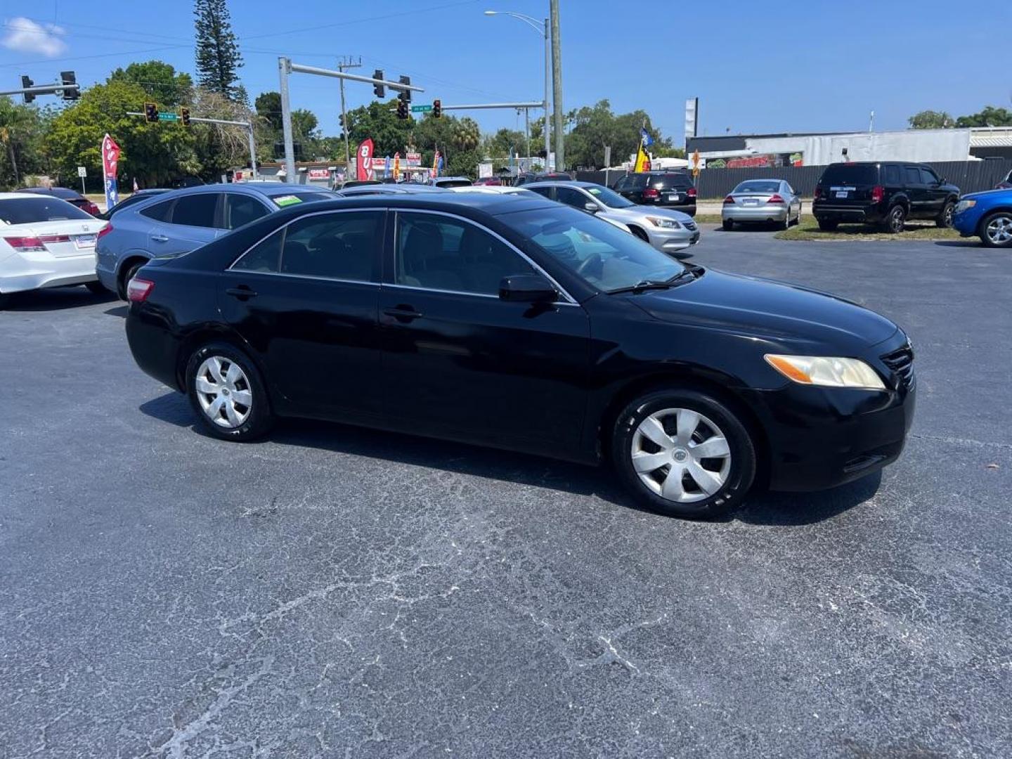 2008 BLACK TOYOTA CAMRY LE (4T1BE46K48U) with an 2.4L engine, Automatic transmission, located at 2929 9th St. West, Bradenton, 34205, (941) 242-2810, 27.473591, -82.570679 - Photo#0