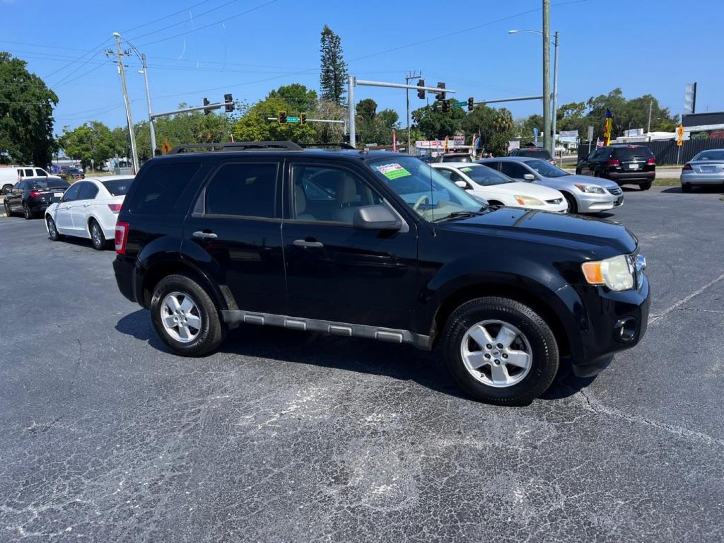 2010 BLACK FORD ESCAPE XLT (1FMCU0DG5AK) with an 3.0L engine, Automatic transmission, located at 2929 9th St. West, Bradenton, 34205, (941) 242-2810, 27.473591, -82.570679 - Photo#1