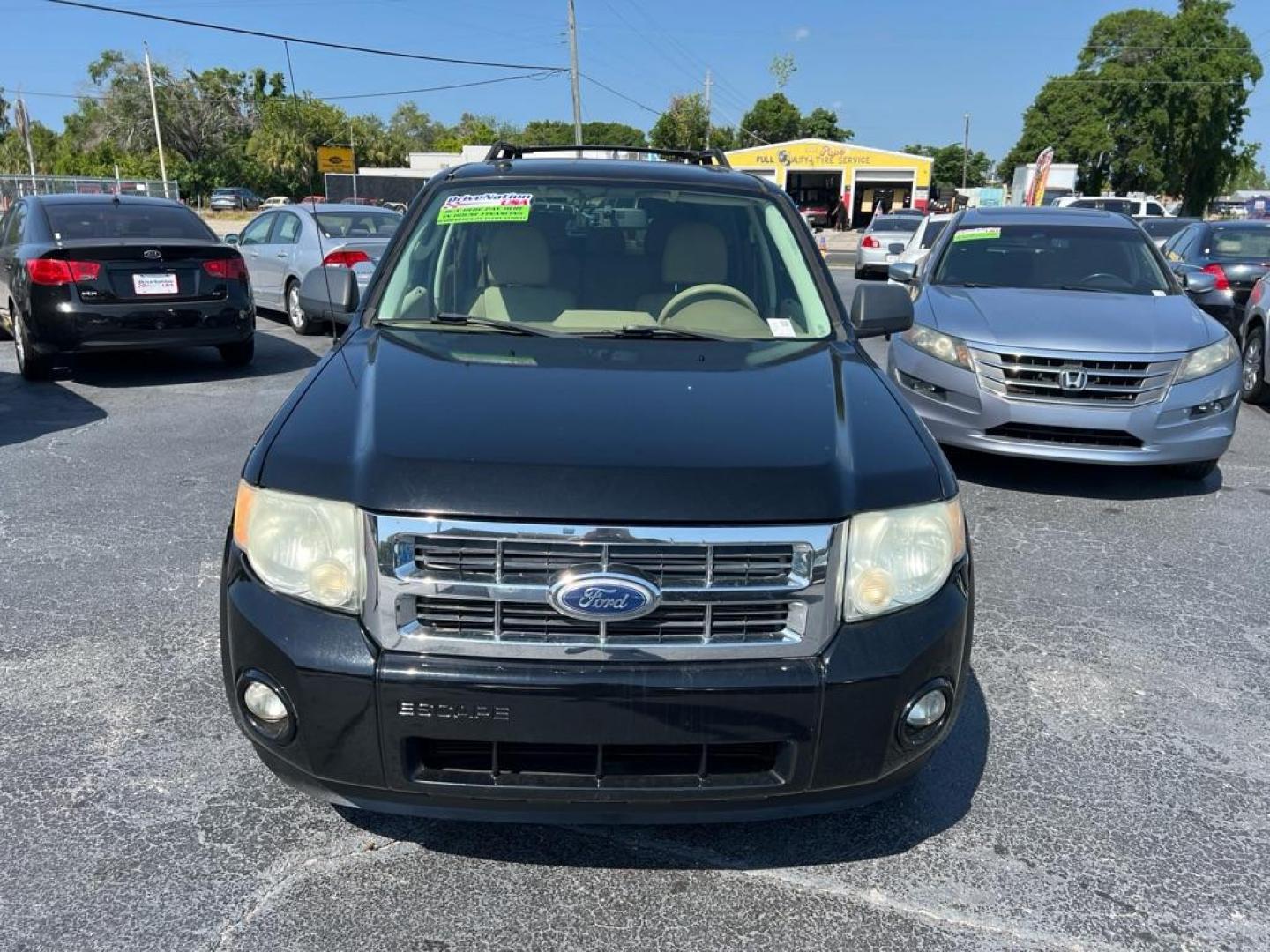 2010 BLACK FORD ESCAPE XLT (1FMCU0DG5AK) with an 3.0L engine, Automatic transmission, located at 2929 9th St. West, Bradenton, 34205, (941) 242-2810, 27.473591, -82.570679 - Photo#2