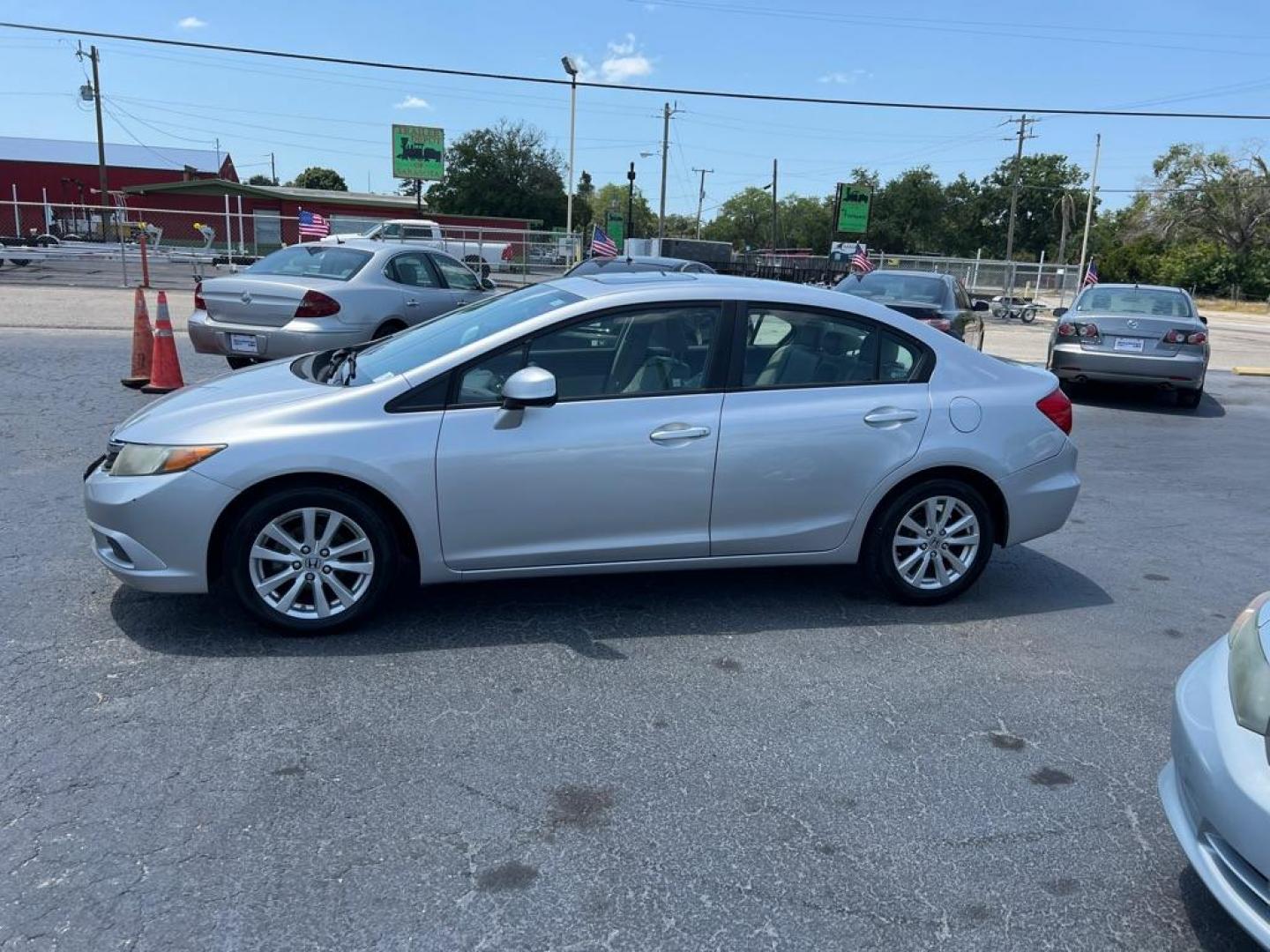 2012 SILVER HONDA CIVIC EXL (19XFB2F9XCE) with an 1.8L engine, Automatic transmission, located at 2929 9th St. West, Bradenton, 34205, (941) 242-2810, 27.473591, -82.570679 - Photo#4