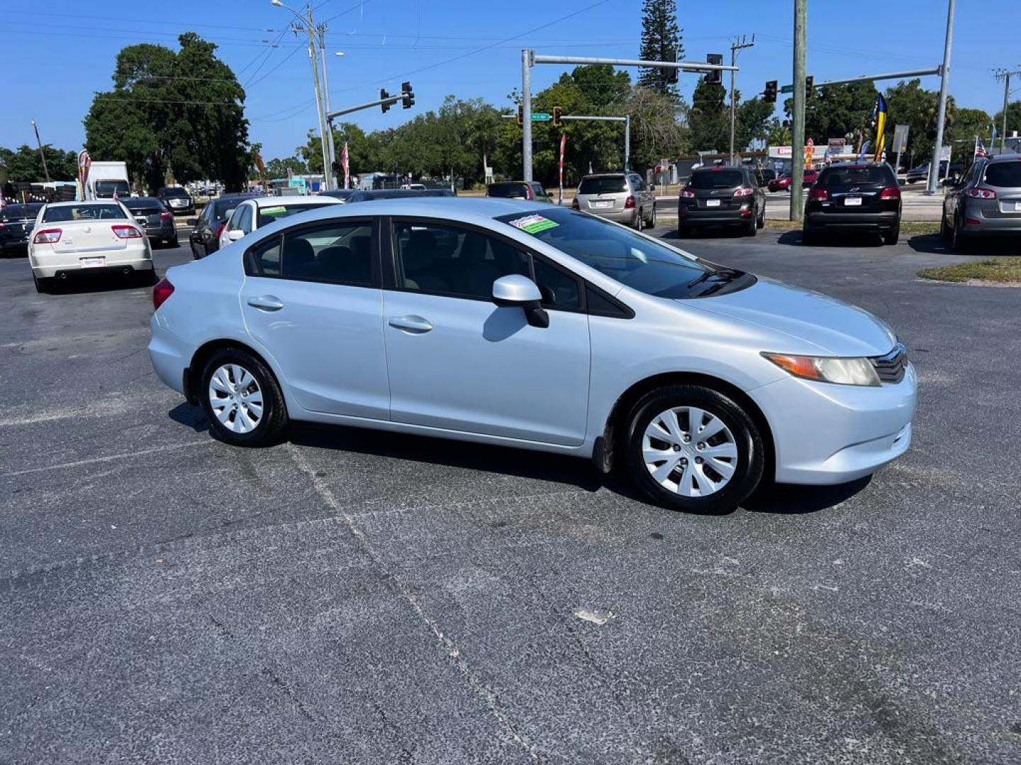 2012 SILVER HONDA CIVIC LX (19XFB2F5XCE) with an 1.8L engine, Automatic transmission, located at 2929 9th St. West, Bradenton, 34205, (941) 242-2810, 27.473591, -82.570679 - Photo#0