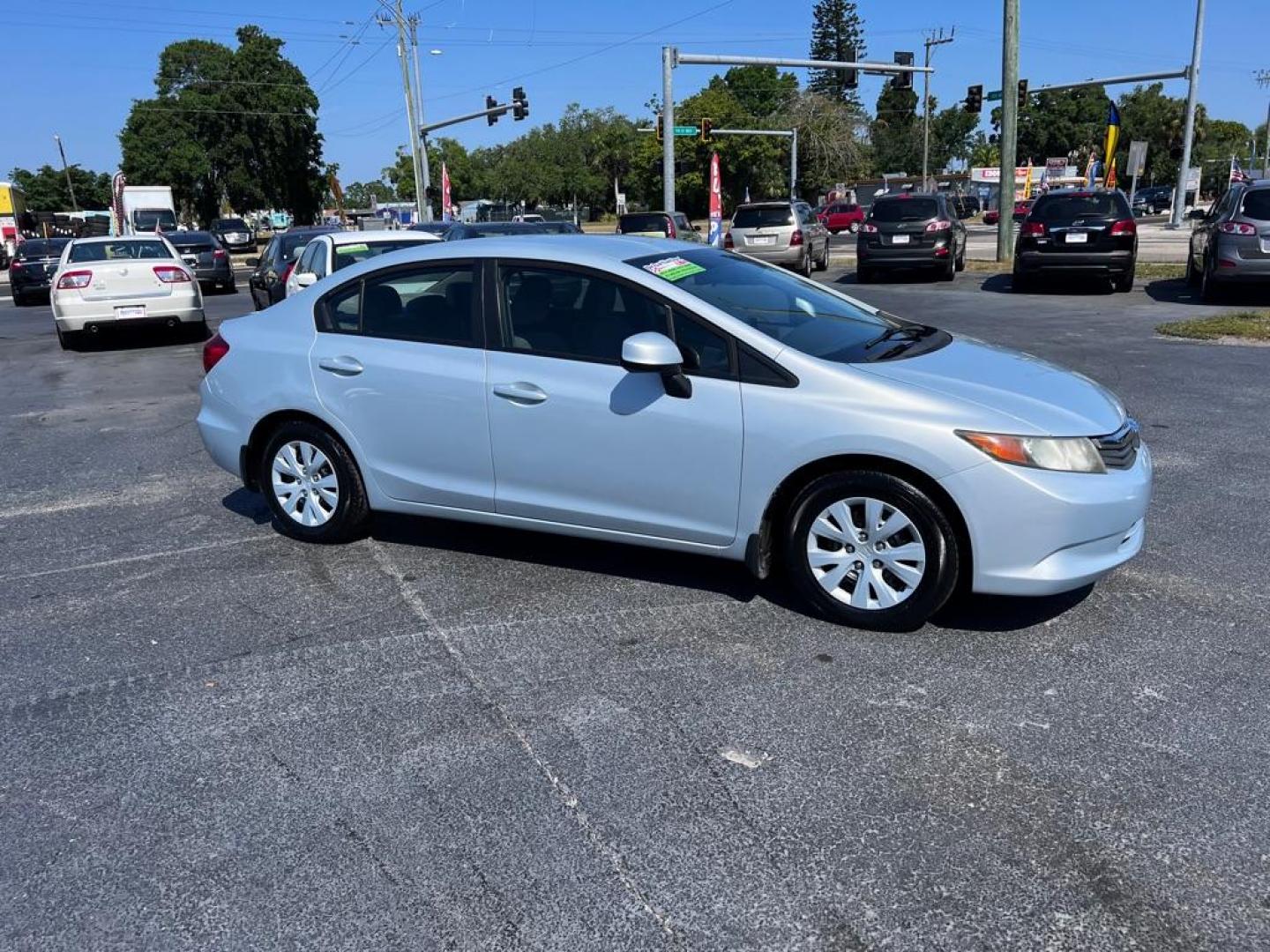 2012 SILVER HONDA CIVIC LX (19XFB2F5XCE) with an 1.8L engine, Automatic transmission, located at 2929 9th St. West, Bradenton, 34205, (941) 242-2810, 27.473591, -82.570679 - Photo#1