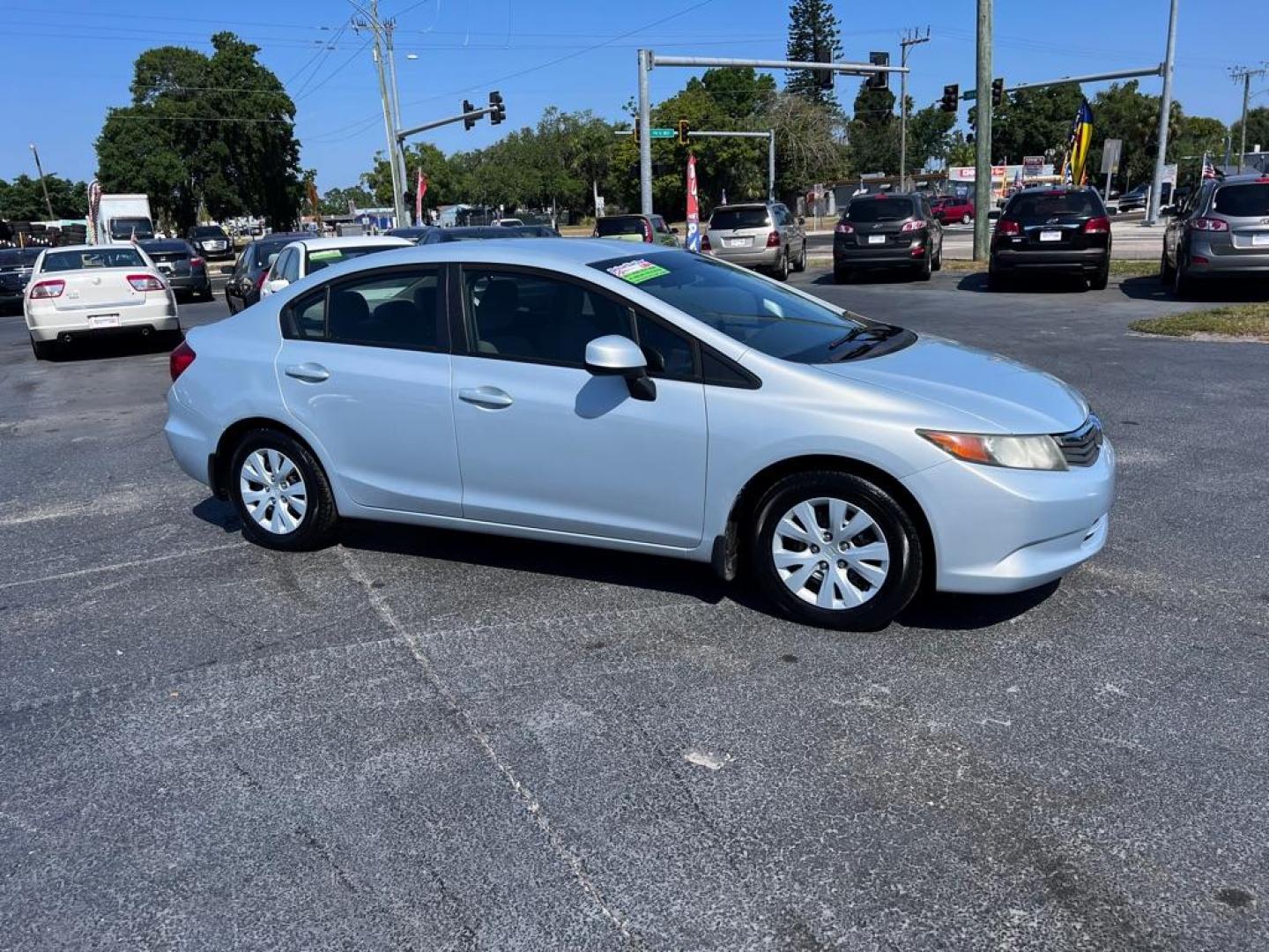 2012 SILVER HONDA CIVIC LX (19XFB2F5XCE) with an 1.8L engine, Automatic transmission, located at 2929 9th St. West, Bradenton, 34205, (941) 242-2810, 27.473591, -82.570679 - Photo#2