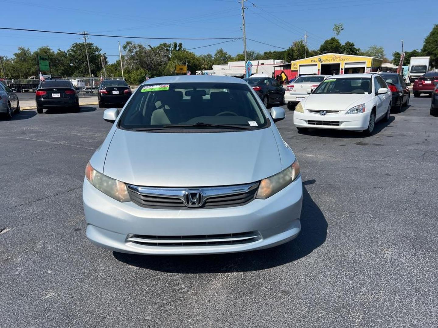 2012 SILVER HONDA CIVIC LX (19XFB2F5XCE) with an 1.8L engine, Automatic transmission, located at 2929 9th St. West, Bradenton, 34205, (941) 242-2810, 27.473591, -82.570679 - Photo#3