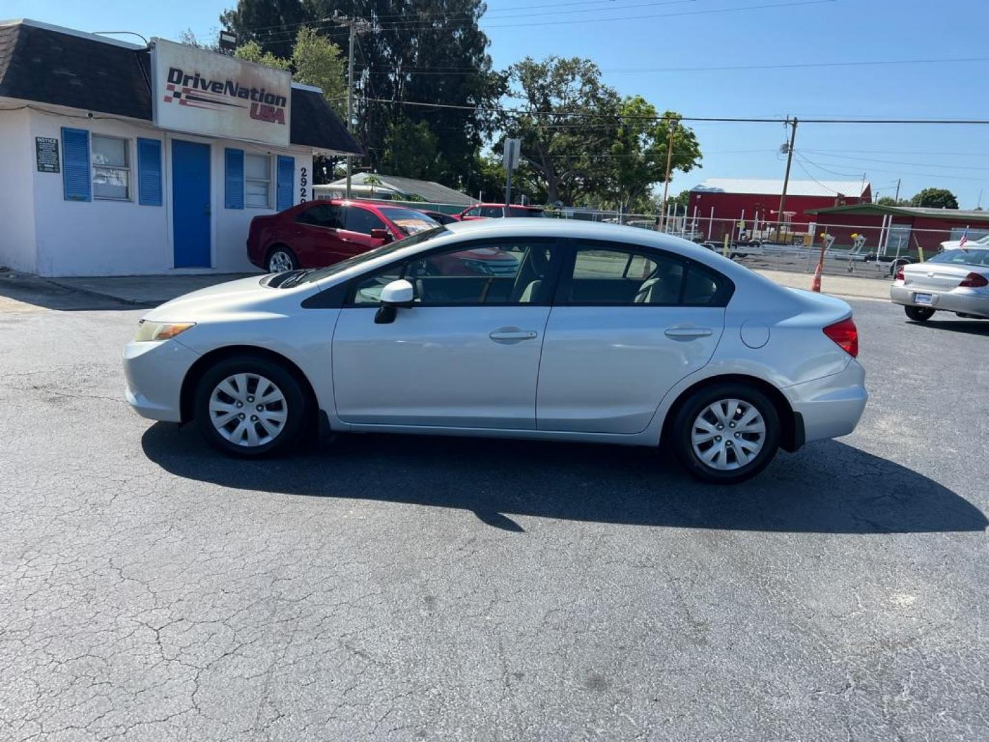 2012 SILVER HONDA CIVIC LX (19XFB2F5XCE) with an 1.8L engine, Automatic transmission, located at 2929 9th St. West, Bradenton, 34205, (941) 242-2810, 27.473591, -82.570679 - Photo#5