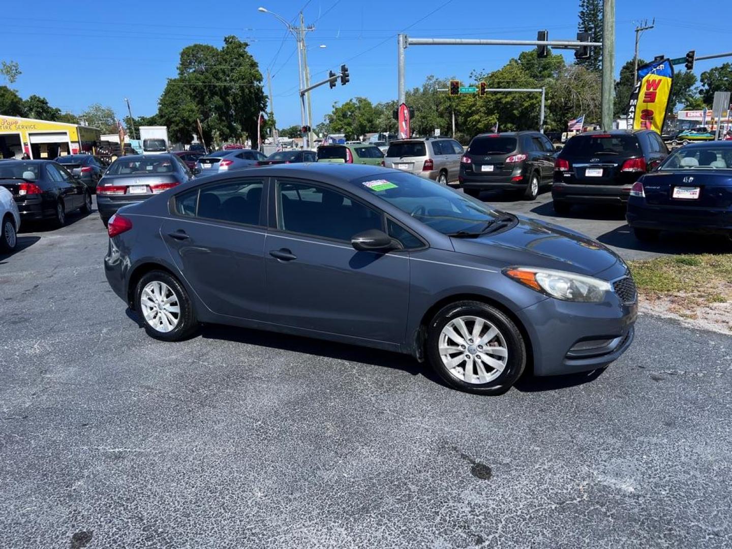 2014 BLUE KIA FORTE LX (KNAFX4A66E5) with an 1.8L engine, Automatic transmission, located at 2929 9th St. West, Bradenton, 34205, (941) 242-2810, 27.473591, -82.570679 - Photo#0