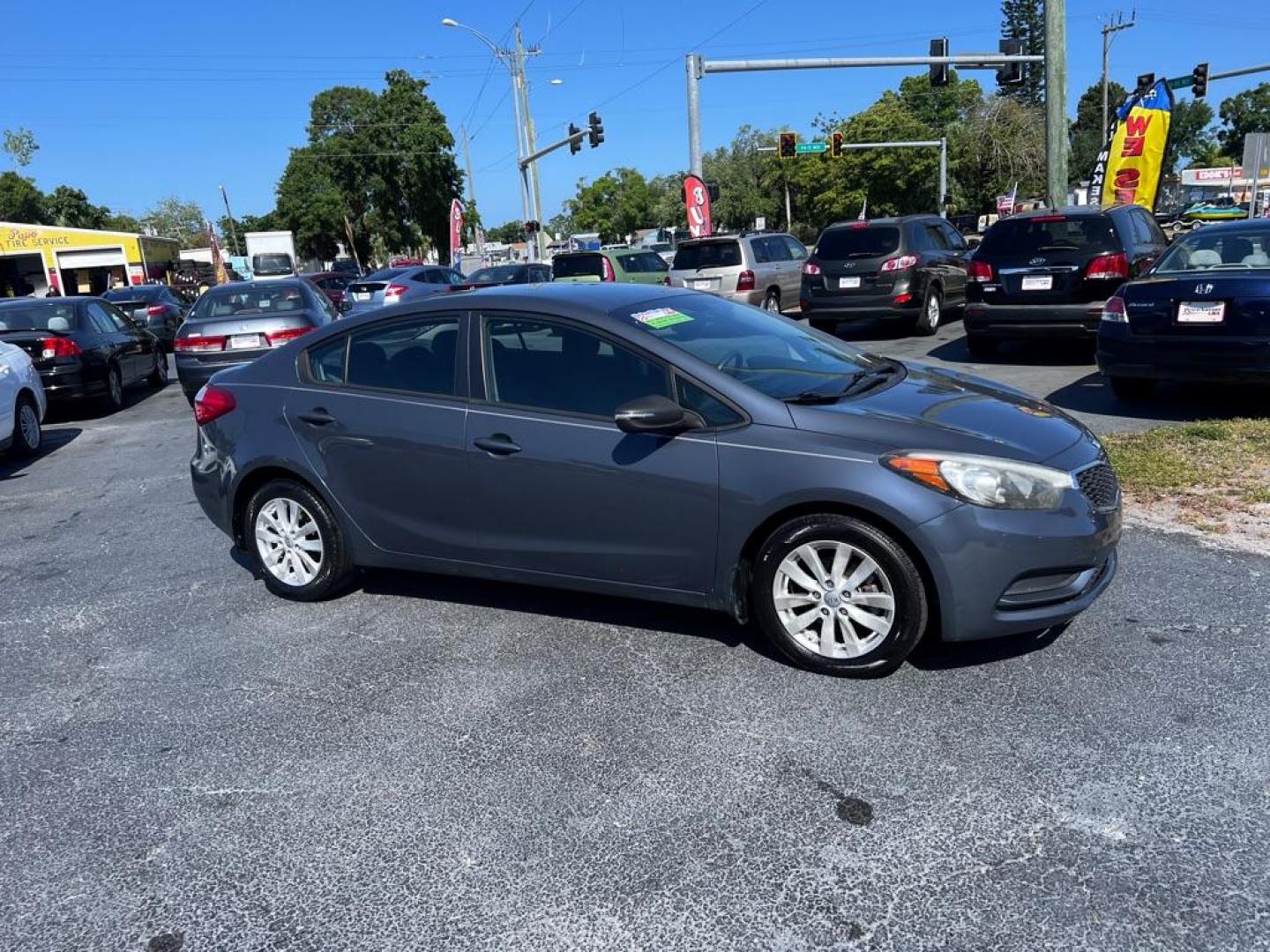 2014 BLUE KIA FORTE LX (KNAFX4A66E5) with an 1.8L engine, Automatic transmission, located at 2929 9th St. West, Bradenton, 34205, (941) 242-2810, 27.473591, -82.570679 - Photo#1