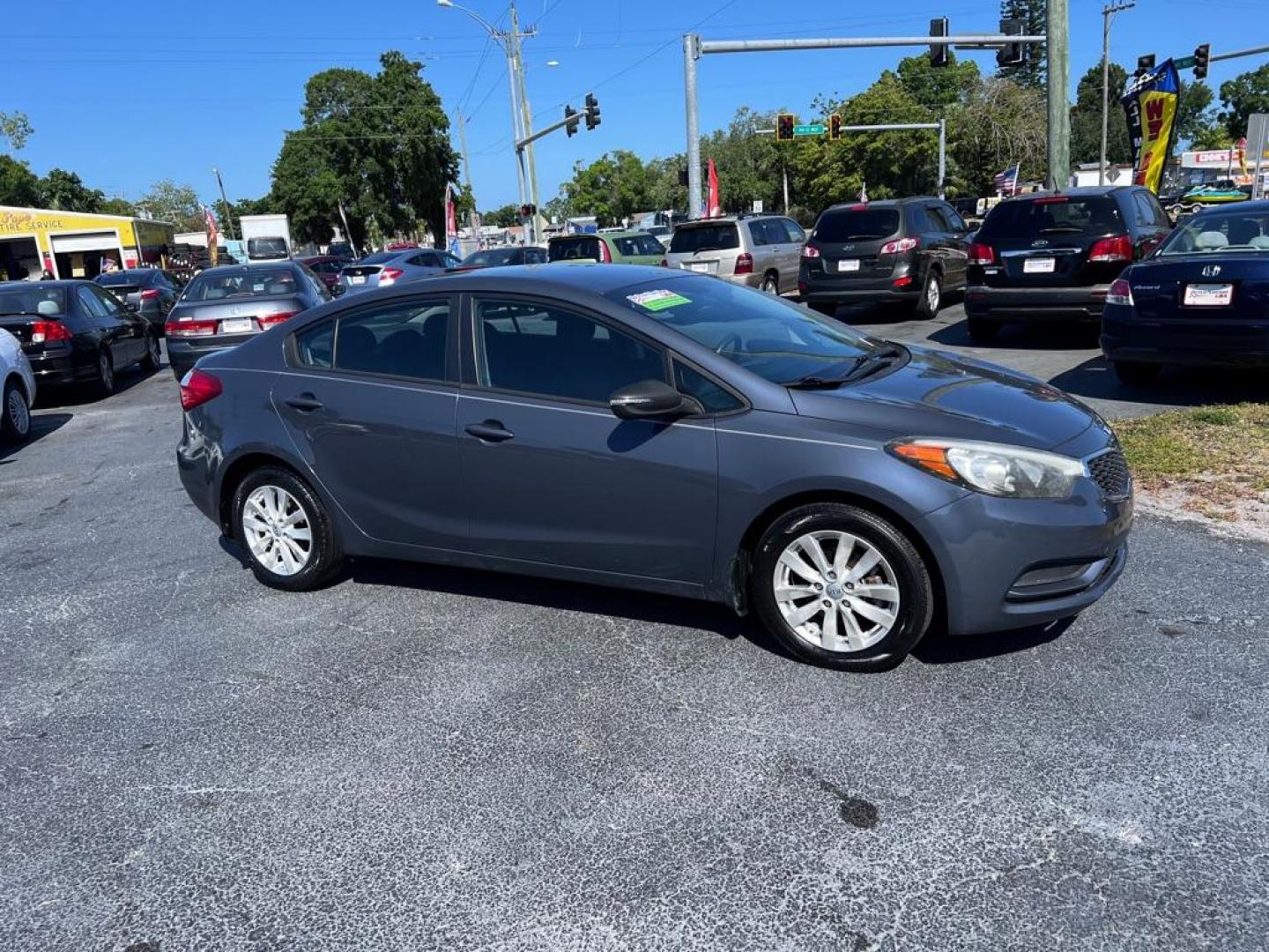 2014 BLUE KIA FORTE LX (KNAFX4A66E5) with an 1.8L engine, Automatic transmission, located at 2929 9th St. West, Bradenton, 34205, (941) 242-2810, 27.473591, -82.570679 - Photo#2