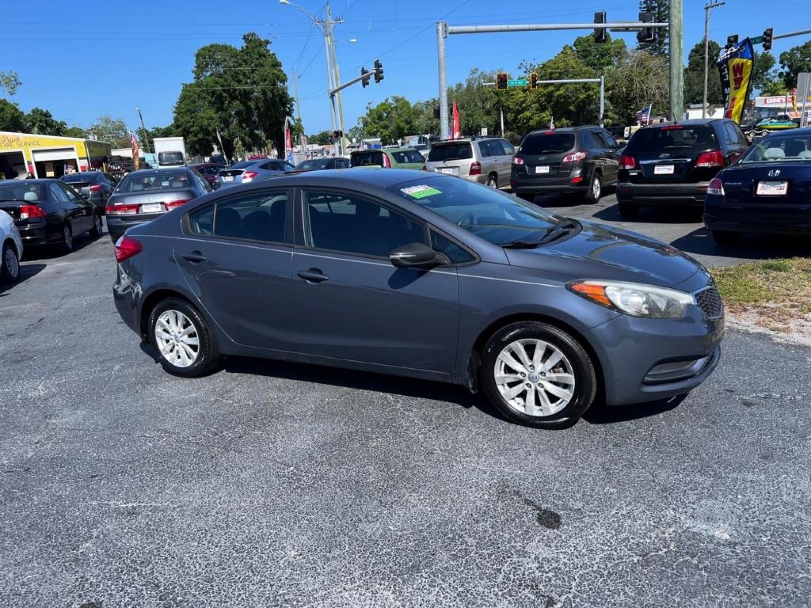 2014 BLUE KIA FORTE LX (KNAFX4A66E5) with an 1.8L engine, Automatic transmission, located at 2929 9th St. West, Bradenton, 34205, (941) 242-2810, 27.473591, -82.570679 - Thanks for inquring into DriveNation USA! All vehicles listed can be viewed at www.drivenationusa.com for vehicle history reports and additonal info. We cannot quote any terms such as down payments or monthly payments without an application. You can apply directly at www.drivenationusa.com or by con - Photo #2