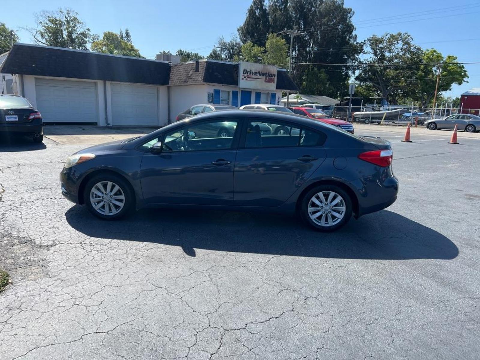 2014 BLUE KIA FORTE LX (KNAFX4A66E5) with an 1.8L engine, Automatic transmission, located at 2929 9th St. West, Bradenton, 34205, (941) 242-2810, 27.473591, -82.570679 - Thanks for inquring into DriveNation USA! All vehicles listed can be viewed at www.drivenationusa.com for vehicle history reports and additonal info. We cannot quote any terms such as down payments or monthly payments without an application. You can apply directly at www.drivenationusa.com or by con - Photo #5