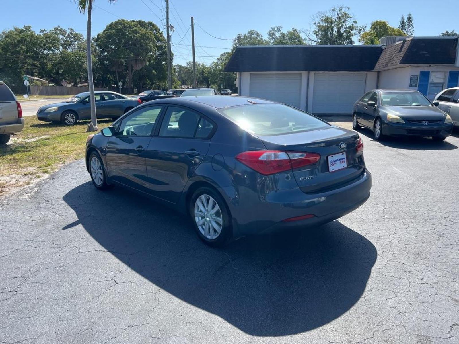 2014 BLUE KIA FORTE LX (KNAFX4A66E5) with an 1.8L engine, Automatic transmission, located at 2929 9th St. West, Bradenton, 34205, (941) 242-2810, 27.473591, -82.570679 - Thanks for inquring into DriveNation USA! All vehicles listed can be viewed at www.drivenationusa.com for vehicle history reports and additonal info. We cannot quote any terms such as down payments or monthly payments without an application. You can apply directly at www.drivenationusa.com or by con - Photo #6