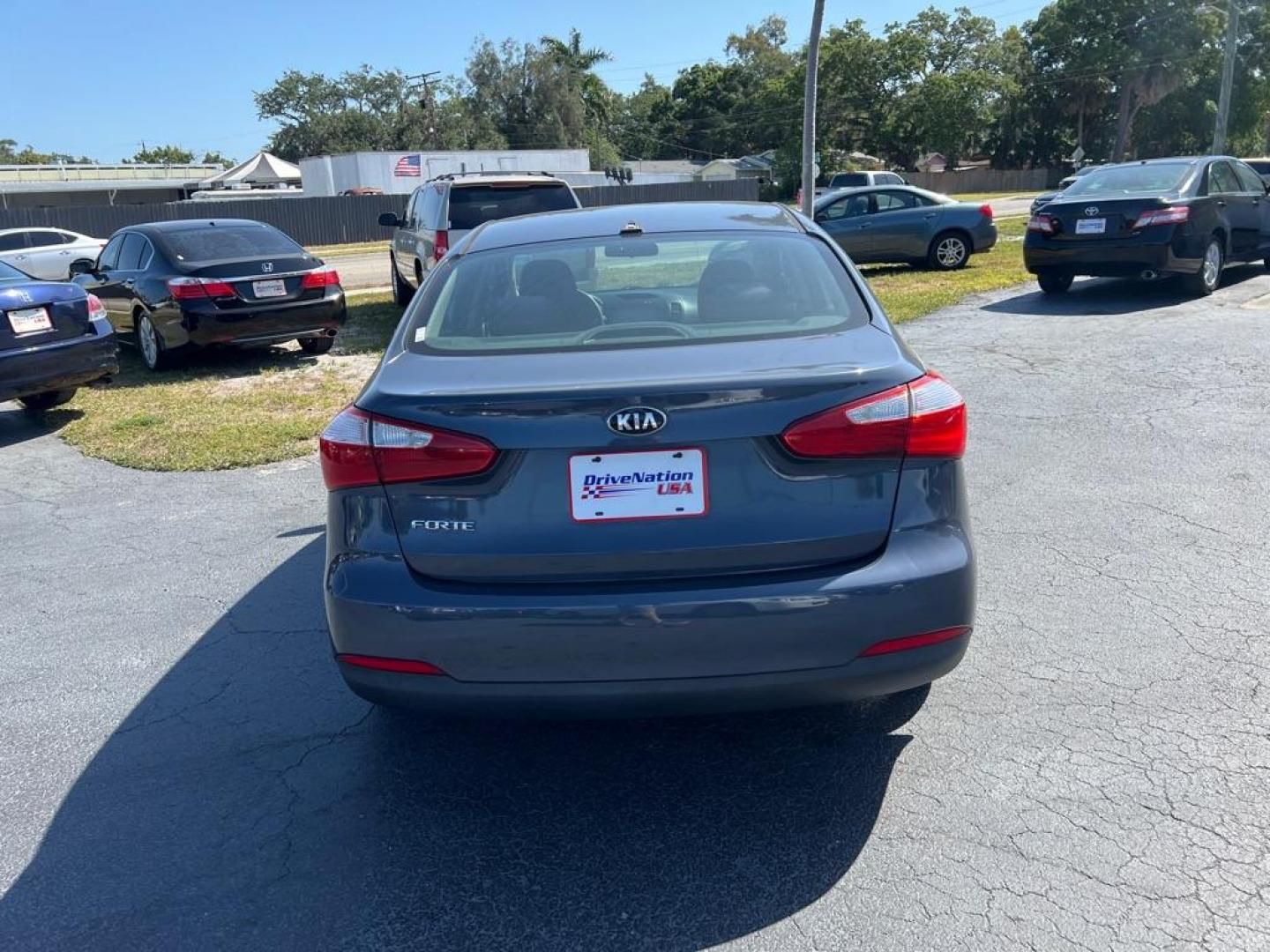 2014 BLUE KIA FORTE LX (KNAFX4A66E5) with an 1.8L engine, Automatic transmission, located at 2929 9th St. West, Bradenton, 34205, (941) 242-2810, 27.473591, -82.570679 - Photo#7