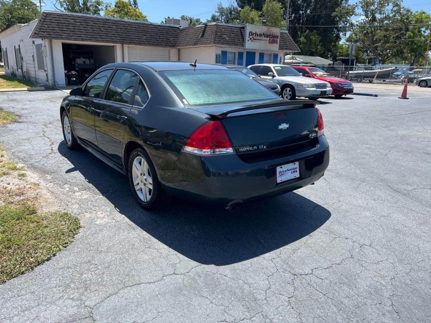 2013 BLACK CHEVROLET IMPALA LT (2G1WG5E37D1) with an 3.6L engine, Automatic transmission, located at 2929 9th St. West, Bradenton, 34205, (941) 242-2810, 27.473591, -82.570679 - Photo#5