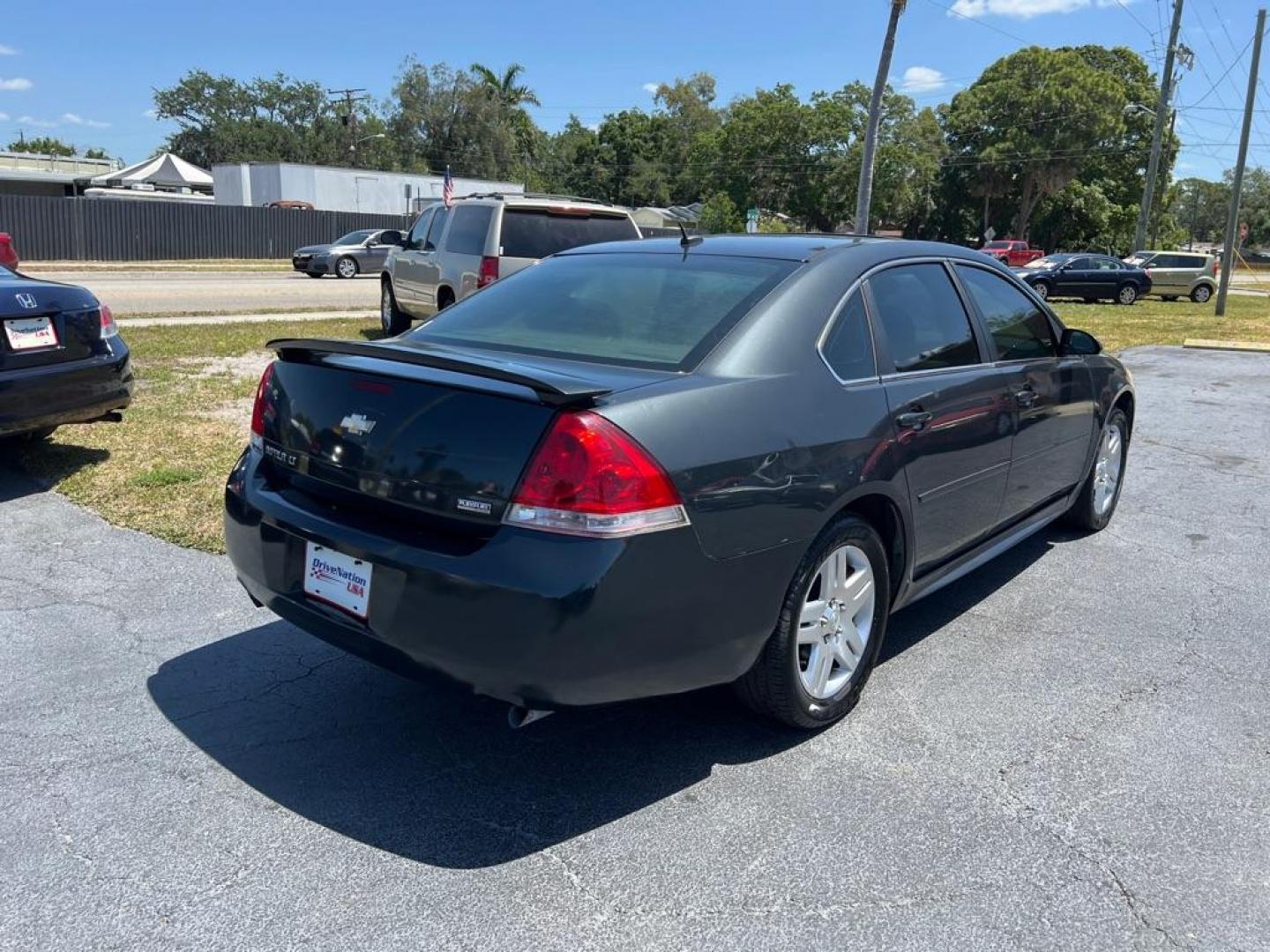 2013 BLACK CHEVROLET IMPALA LT (2G1WG5E37D1) with an 3.6L engine, Automatic transmission, located at 2929 9th St. West, Bradenton, 34205, (941) 242-2810, 27.473591, -82.570679 - Photo#6